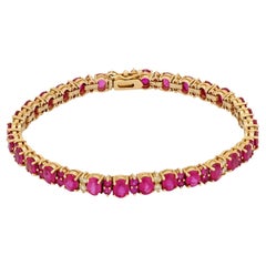 Vintage 13.45 carat total weight ruby diamond 14k yellow gold tennis bracelet