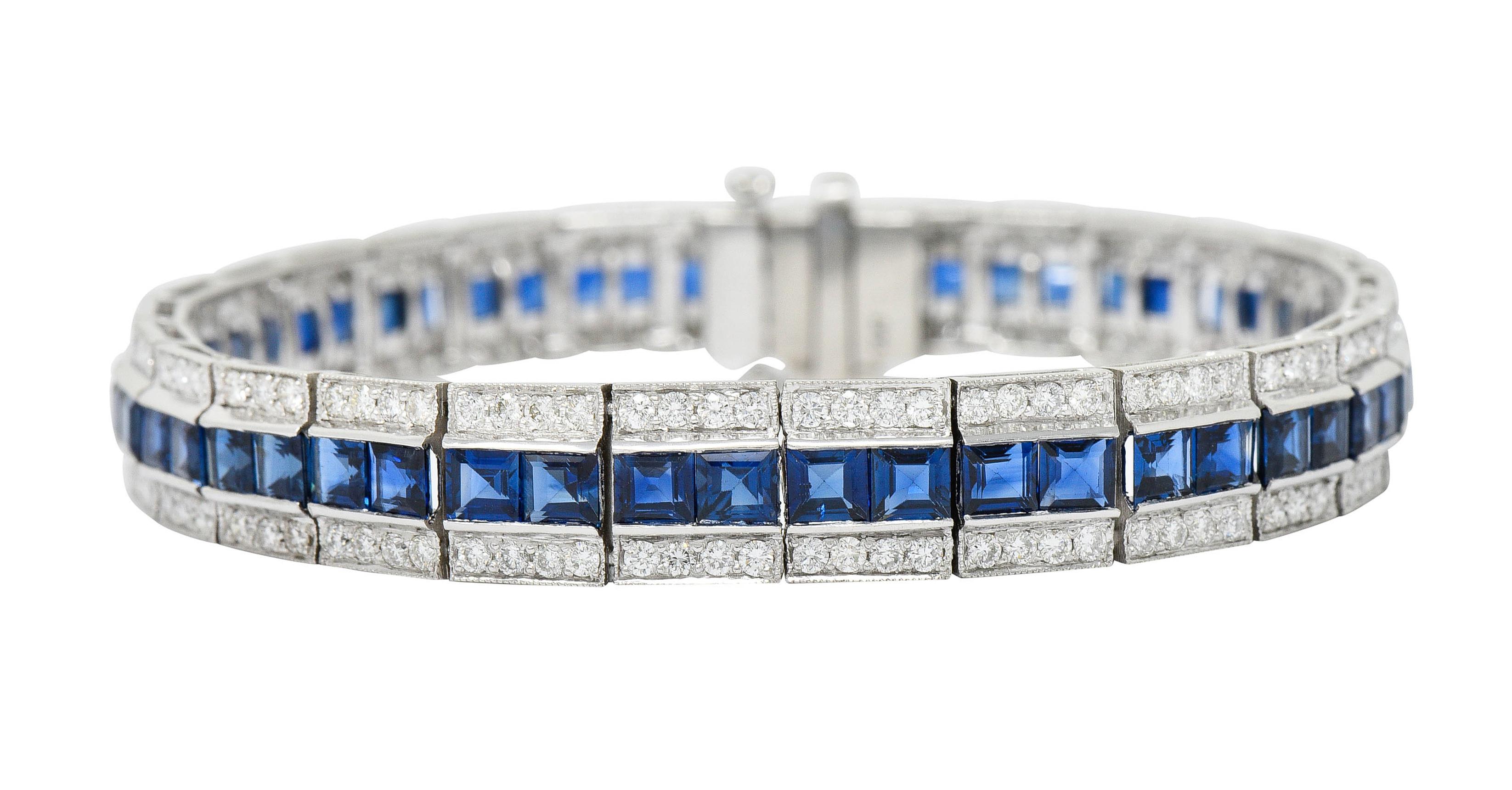 Wide line bracelet is comprised of rectangular links

Centering channel set square cut sapphires that subtly graduate in size

Very well matched, transparent, and royal blue in color while weighing approximately 10.65 carats total

Accented by round