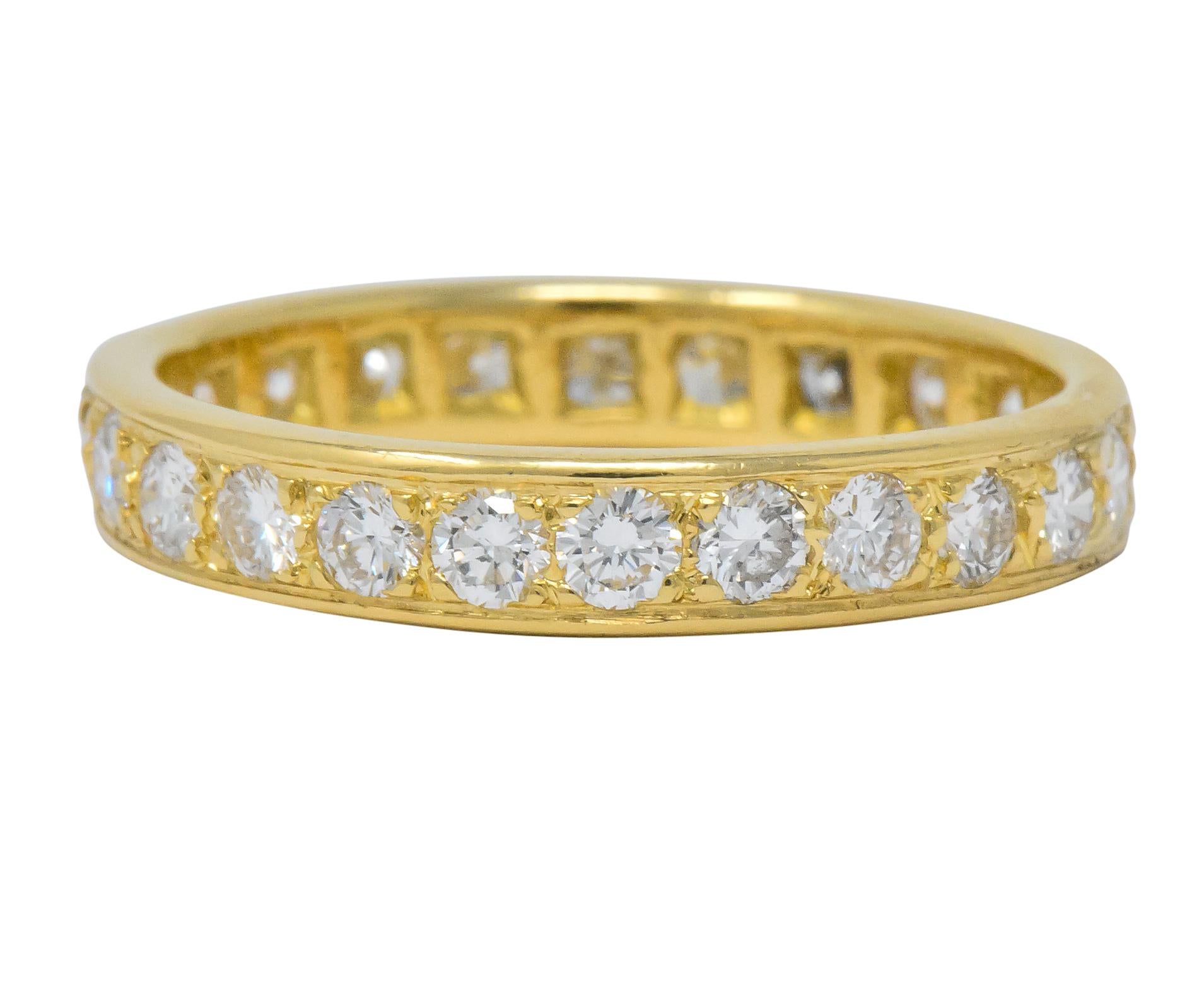 Round brilliant cut diamonds weighing approximately 1.38 carats total, G/H color and VVS to VS clarity

Completely bead set surface with high polished edging

Tested as 18 karat gold

Ring Size: 8 3/4 & Not Sizable

Top measures: 3.8 mm and sits 1.9