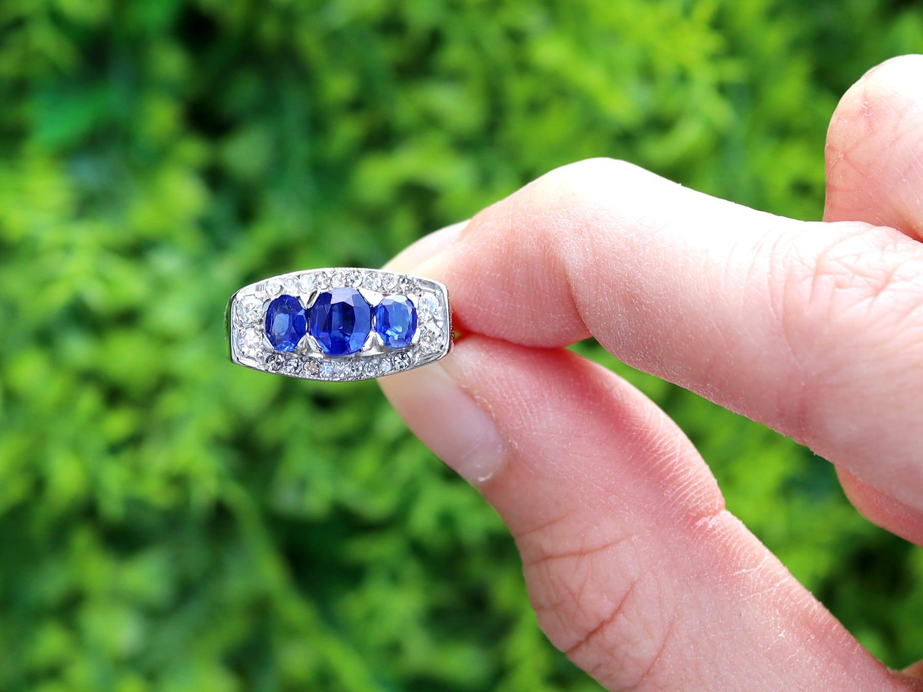 A fine and impressive 1.38 carat sapphire and 0.25 carat diamond, 18 karat white gold dress ring; part of our diverse collection of sapphire dress rings.

This fine and impressive vintage sapphire ring has been crafted in 18k white gold.

The
