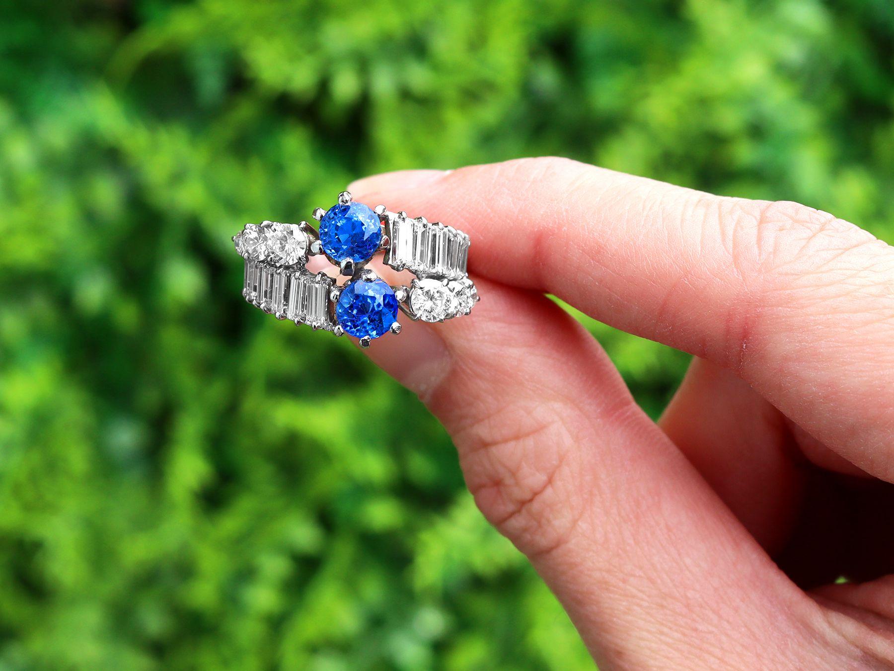 A stunning, fine and impressive vintage 1.38 carat blue sapphire and 2.55 carat diamond, 18 carat white gold dress ring; part of our diverse vintage jewellery collections.

This stunning, fine and impressive vintage sapphire and diamond ring has