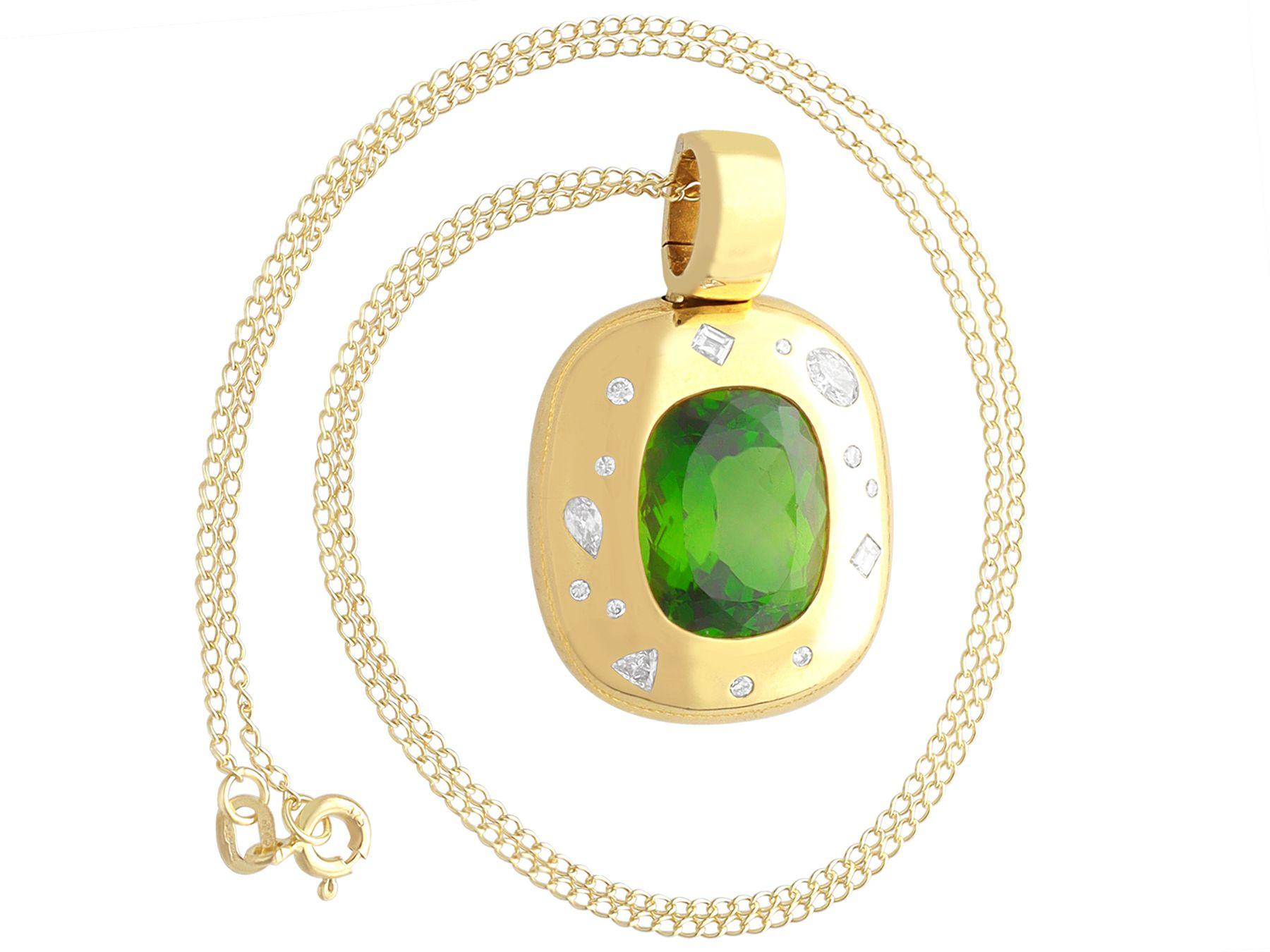 A stunning, fine and impressive 13.94 carat tourmaline and 0.79 carat diamond, 18 karat yellow gold pendant; part of our diverse gemstone jewellery collections.

This stunning, fine and impressive vintage pendant has been crafted in 18k yellow