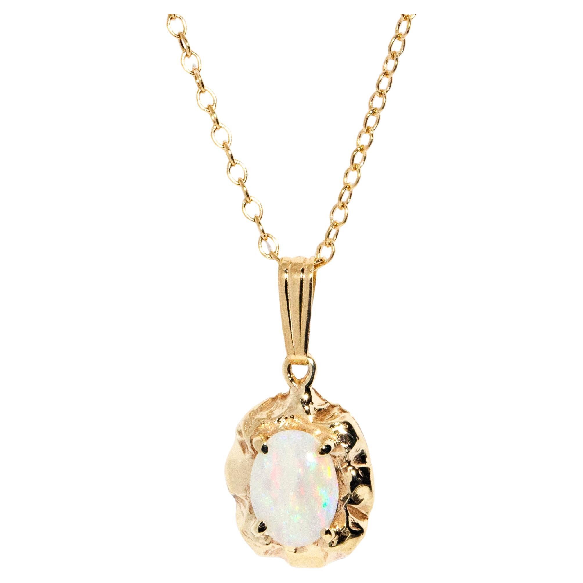 Vintage 14 Carat Gold Oval Australian Crystal Opal Pendant 
9 Carat Gold Chain