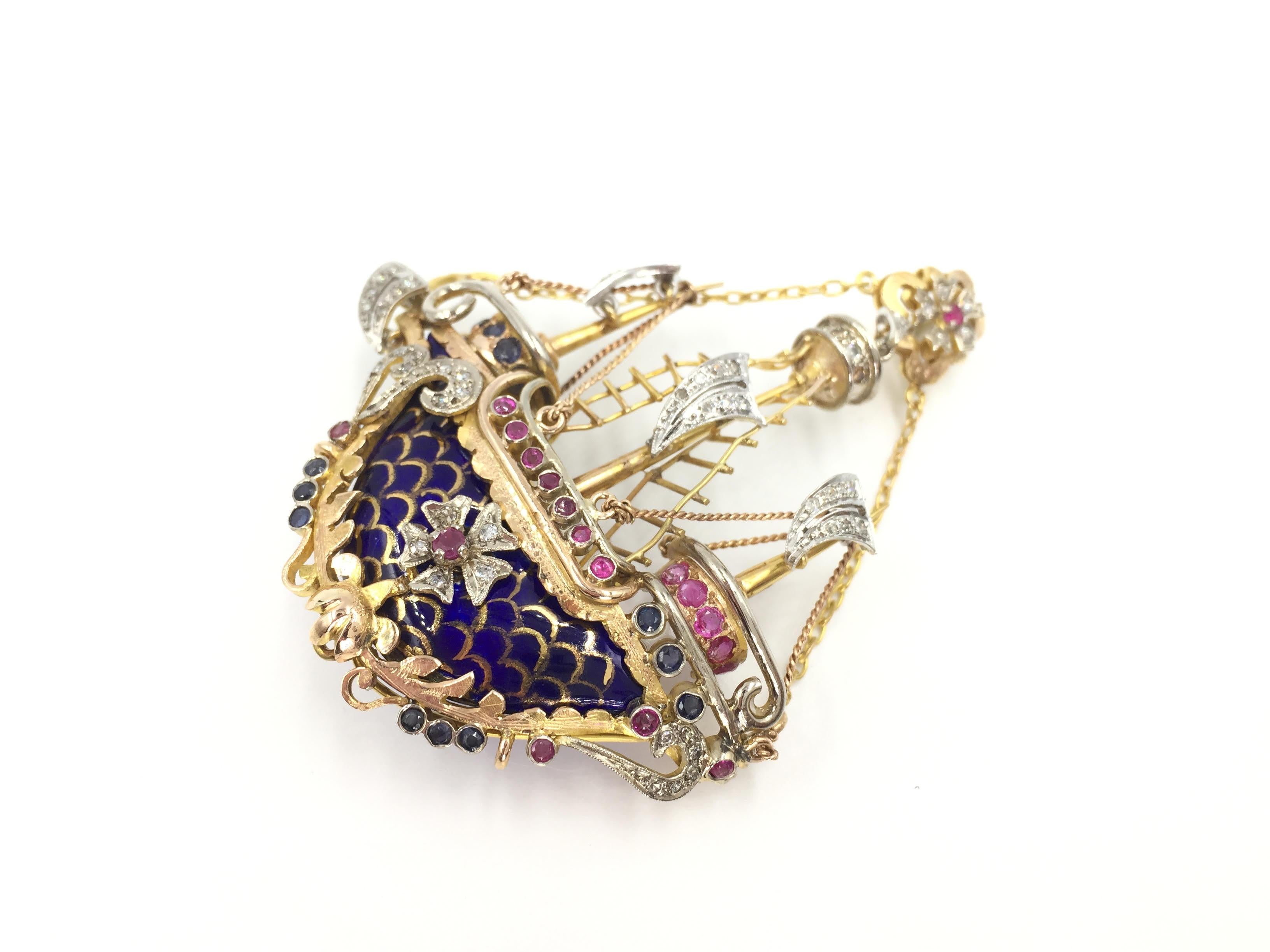 Circa 1940's large hand-crafted intricate sailing ship brooch that doubles as a pendant. 14 Karat yellow gold sailing ship has incredible detail down to the roped ladders and crows nest on the main mast. Even two of the diamond sails are designed to