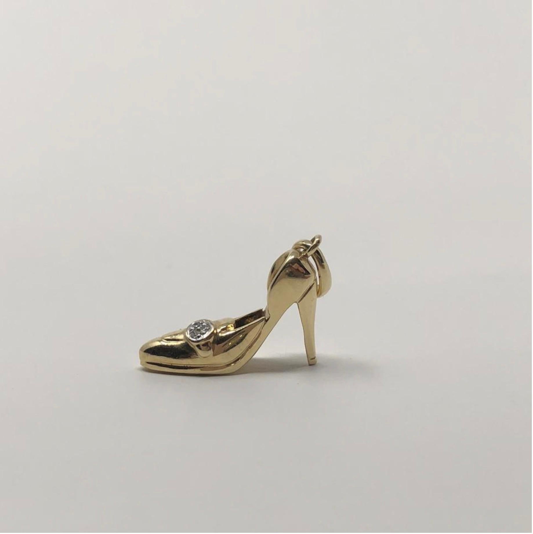 MODEL - Vintage 14k Gold 1/10ct TDW Diamond High Heel Shoe Pendant Charm

CONDITION - Exceptional! No signs of wear.

SKU - 2361-FL

ORIGINAL RETAIL PRICE - 200 + tax

MATERIAL - 14k Gold

WEIGHT - 2.5 grams

DIMENSIONS - L.25 x H.75 (1 with bail) x