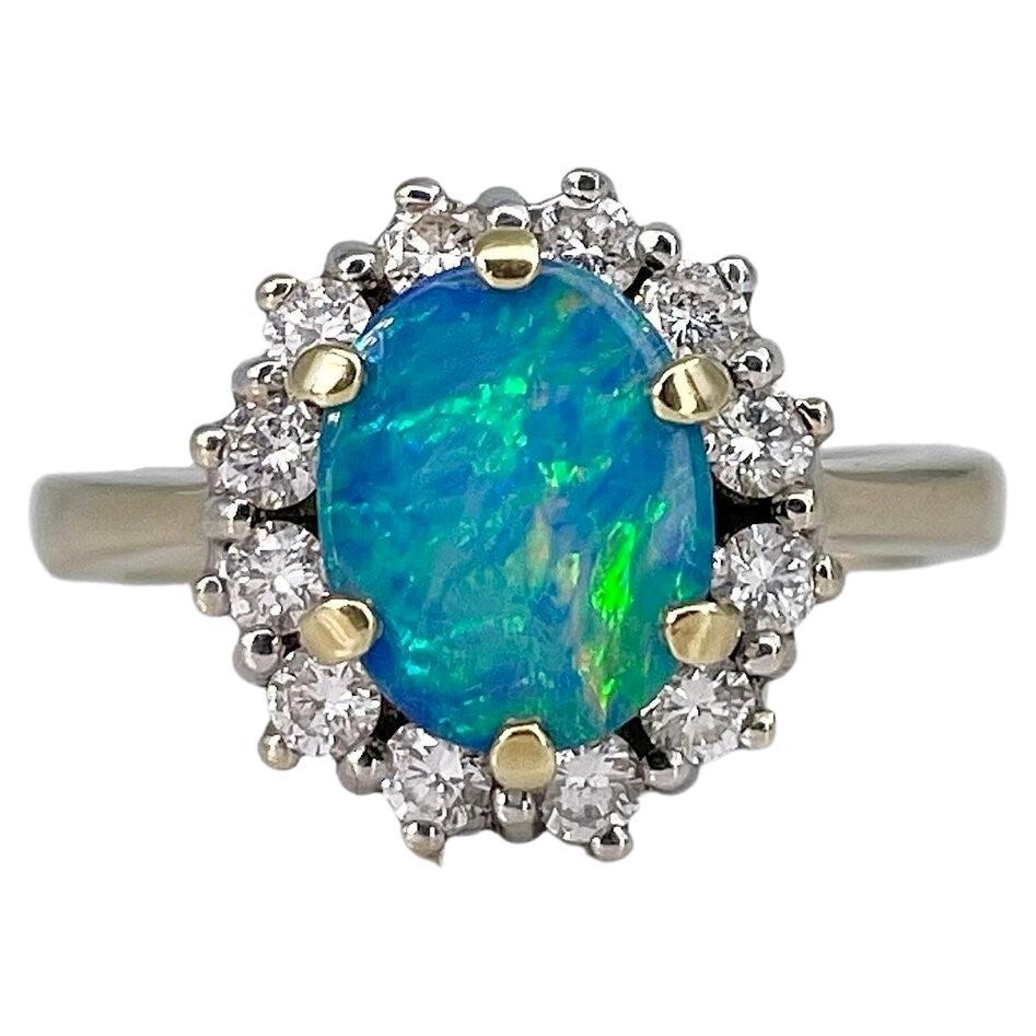 Vintage 14 Karat Gold 1.50 Carat Opal Doublet 0.55 Carat Diamond Cluster Ring