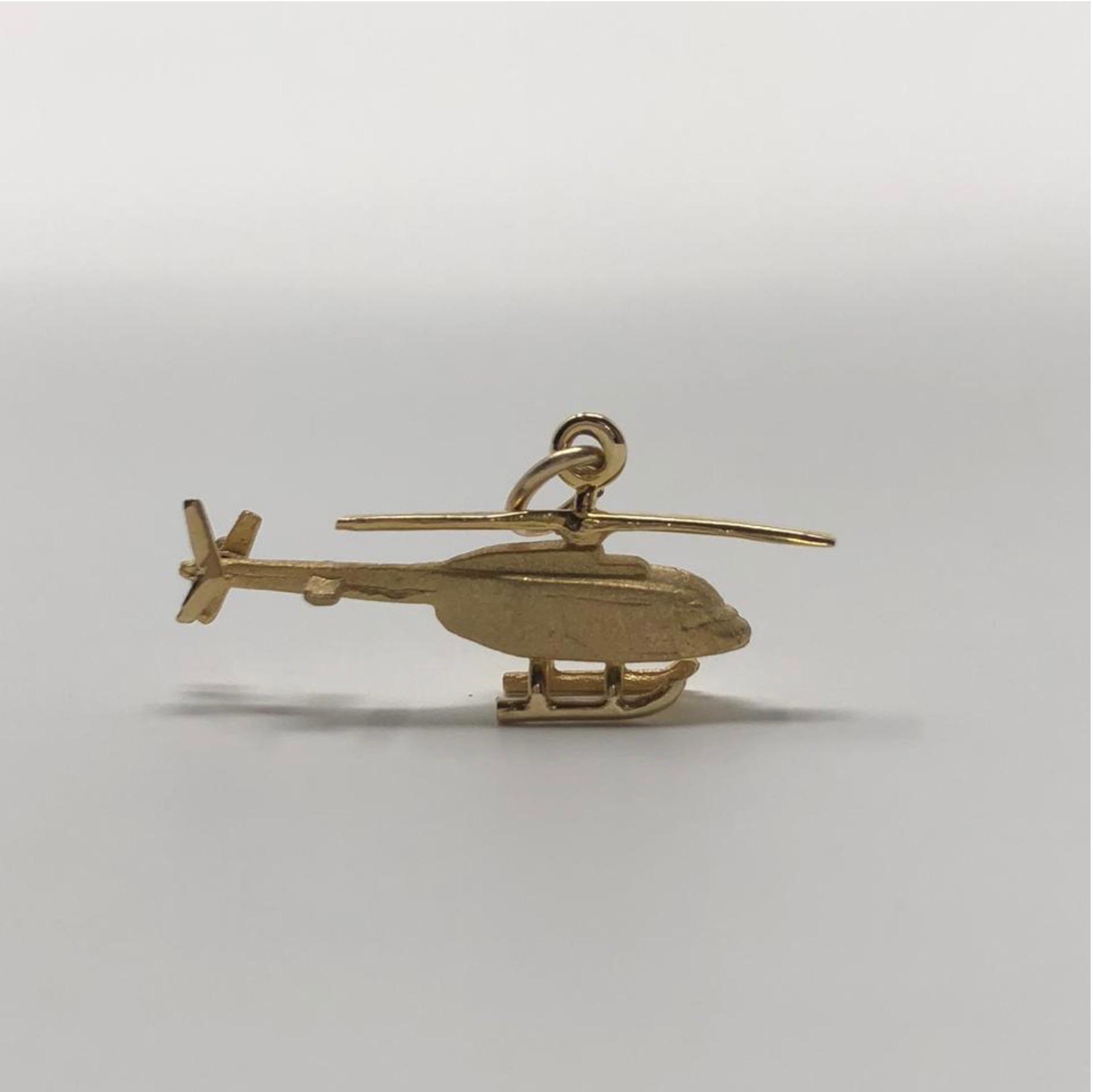 MODEL - Vintage 14k Gold Alaska Helicopter Pendent Charm

CONDITION - Exceptional! No signs of wear.

SKU - 2377-FL

ORIGINAL RETAIL PRICE - 175 + tax

MATERIAL - 14k Gold

WEIGHT - 1.75 grams

DIMENSIONS - L.9x H.4 (.5 with bail) x D.2

COMES WITH