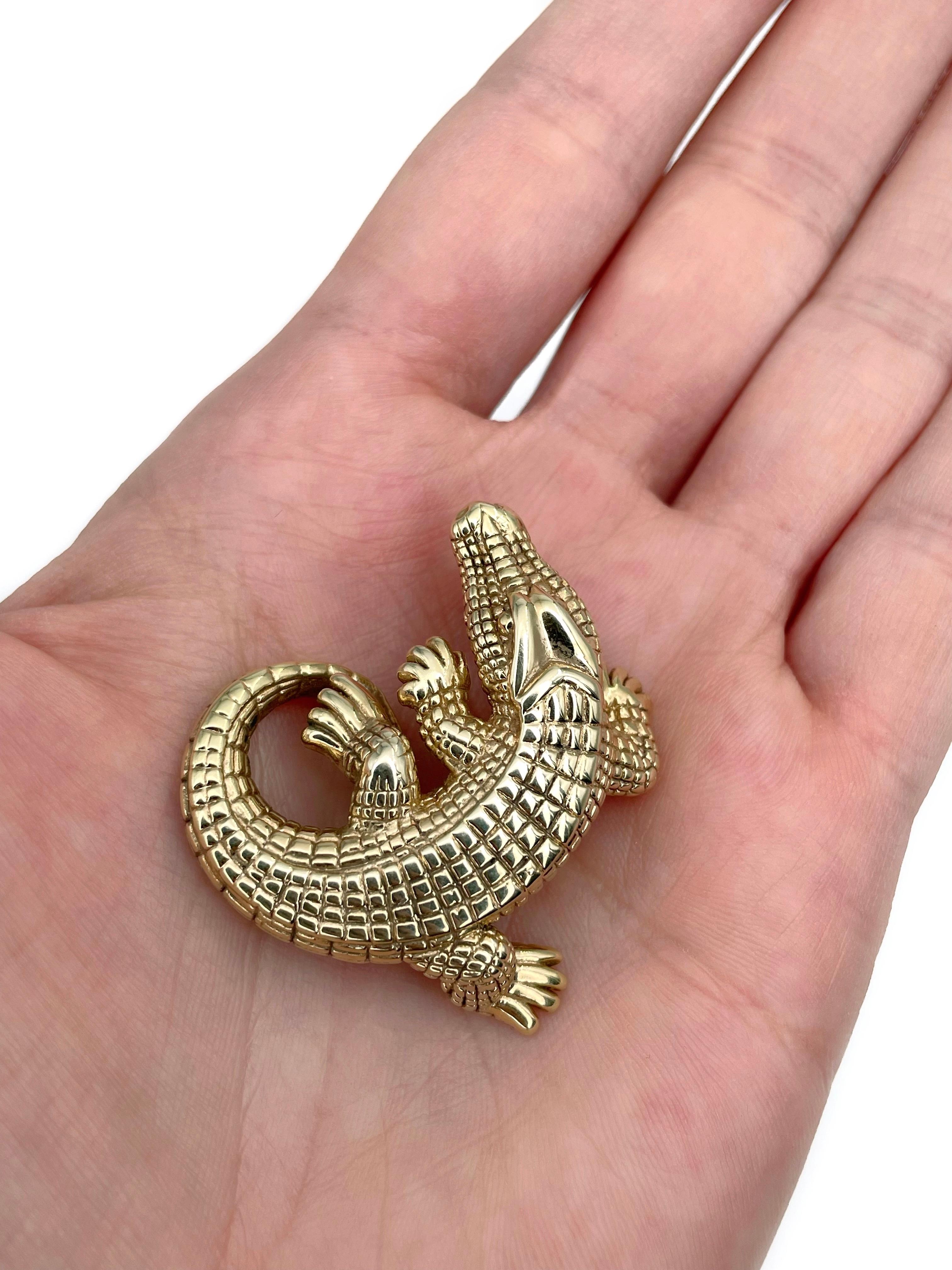 Dies ist ein Vintage Alligator Form Folie Anhänger in 14K Gold gefertigt. Circa 1980.

Signiert mit 