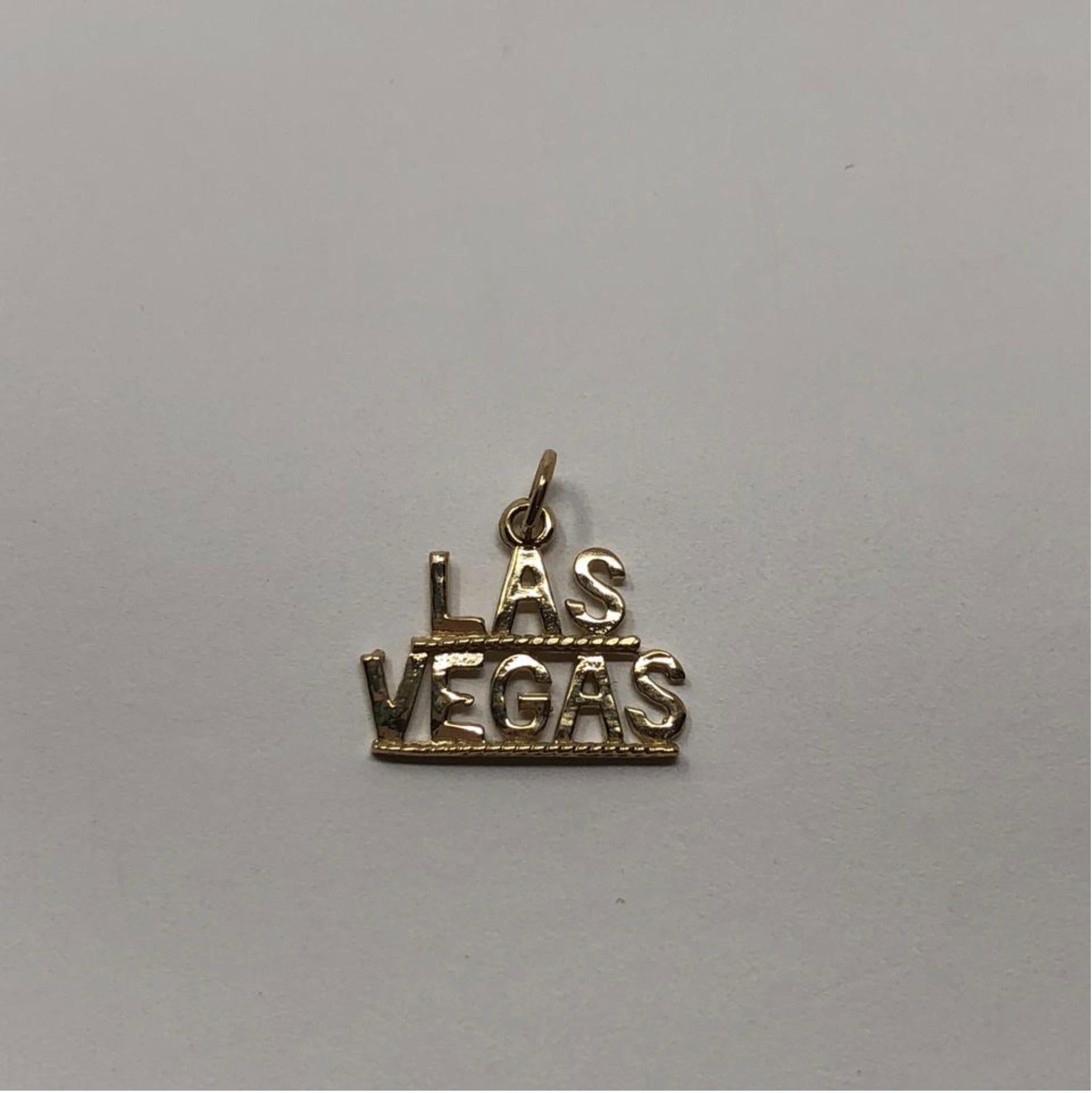 MODEL - Vintage 14k Gold Las Vegas Pendent Charm

CONDITION - Exceptional! No signs of wear.

SKU - 2384-FL

ORIGINAL RETAIL PRICE - 175 + tax

MATERIAL - 14k Gold

WEIGHT - 1.5 grams

DIMENSIONS - L.75 x H.7 (.75 with bail) x D.1

COMES WITH - No