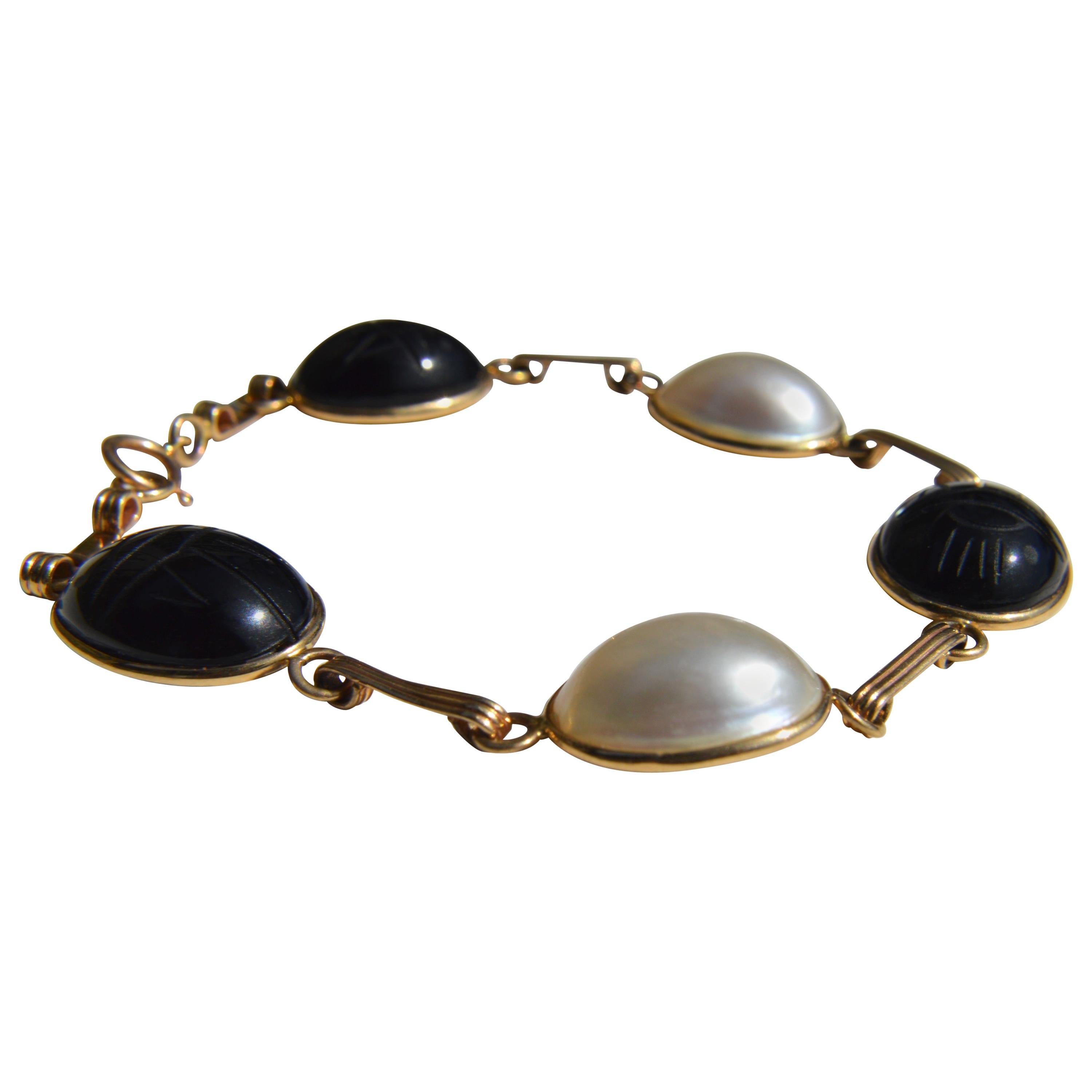 Vintage 14 Karat Gold Mother of Pearl and Onyx Scarab Bracelet