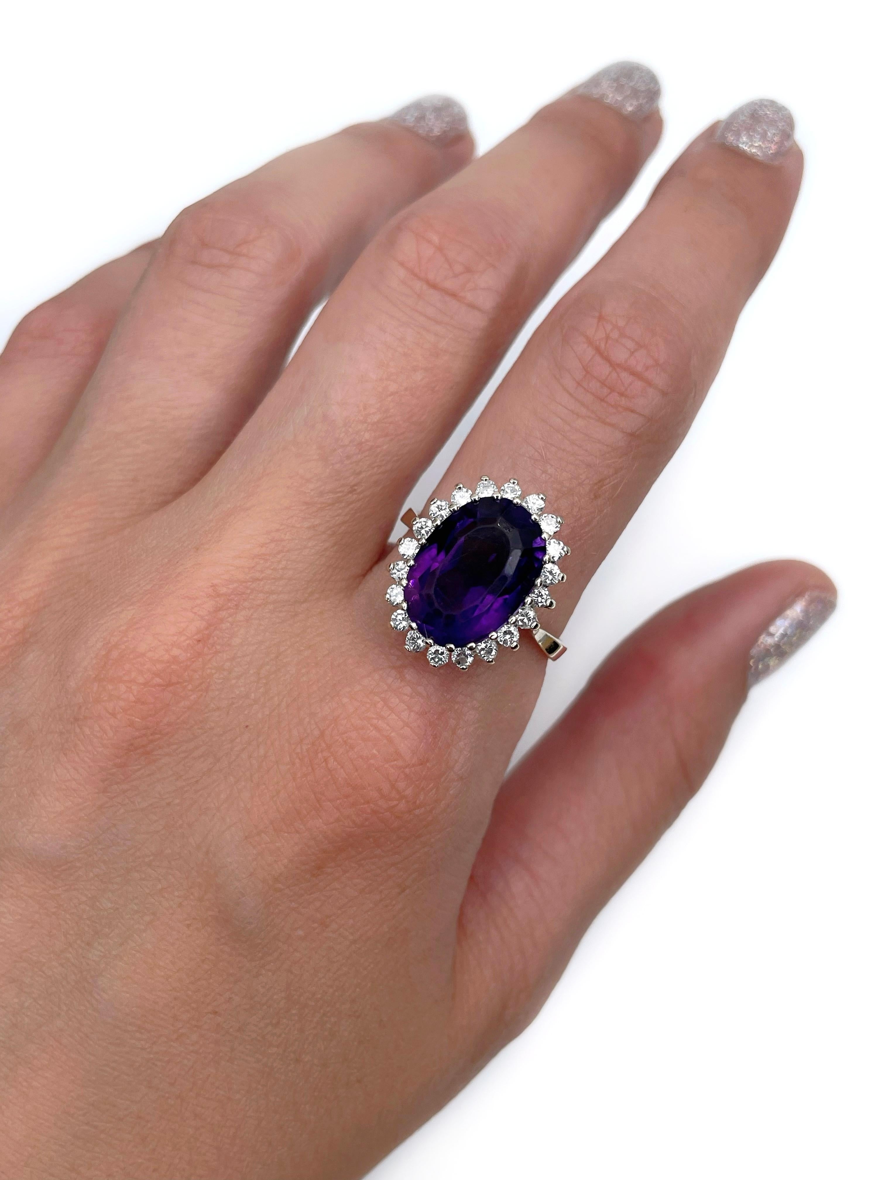This is a vintage cluster ring crafted in 14K gold. Circa 1980. The piece features:
- Amethyst: 1pc., oval cut
- Diamonds: 20pcs., round brilliant cut, TW 0.60ct, RW-W, SI-P1

Weight: 4.91g 
Size: 18.75 (US 8.75)

IMPORTANT: please ask about the