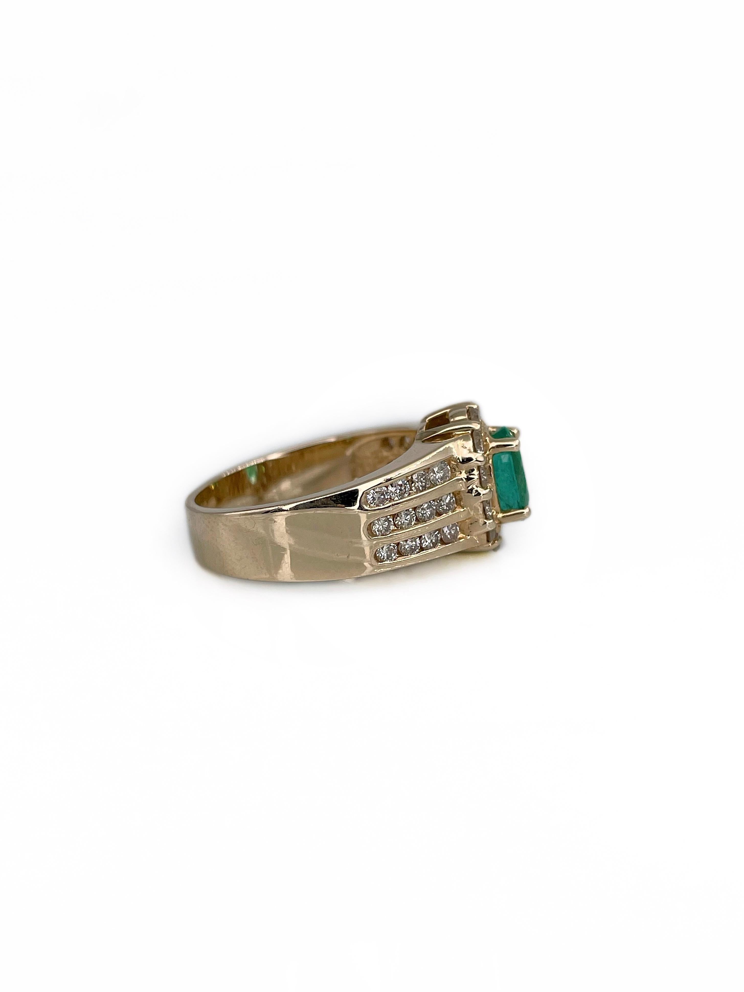 Modern Vintage 14 Karat Gold 0.90 Carat Oval Emerald 0.85 Carat Diamond Cluster Ring For Sale