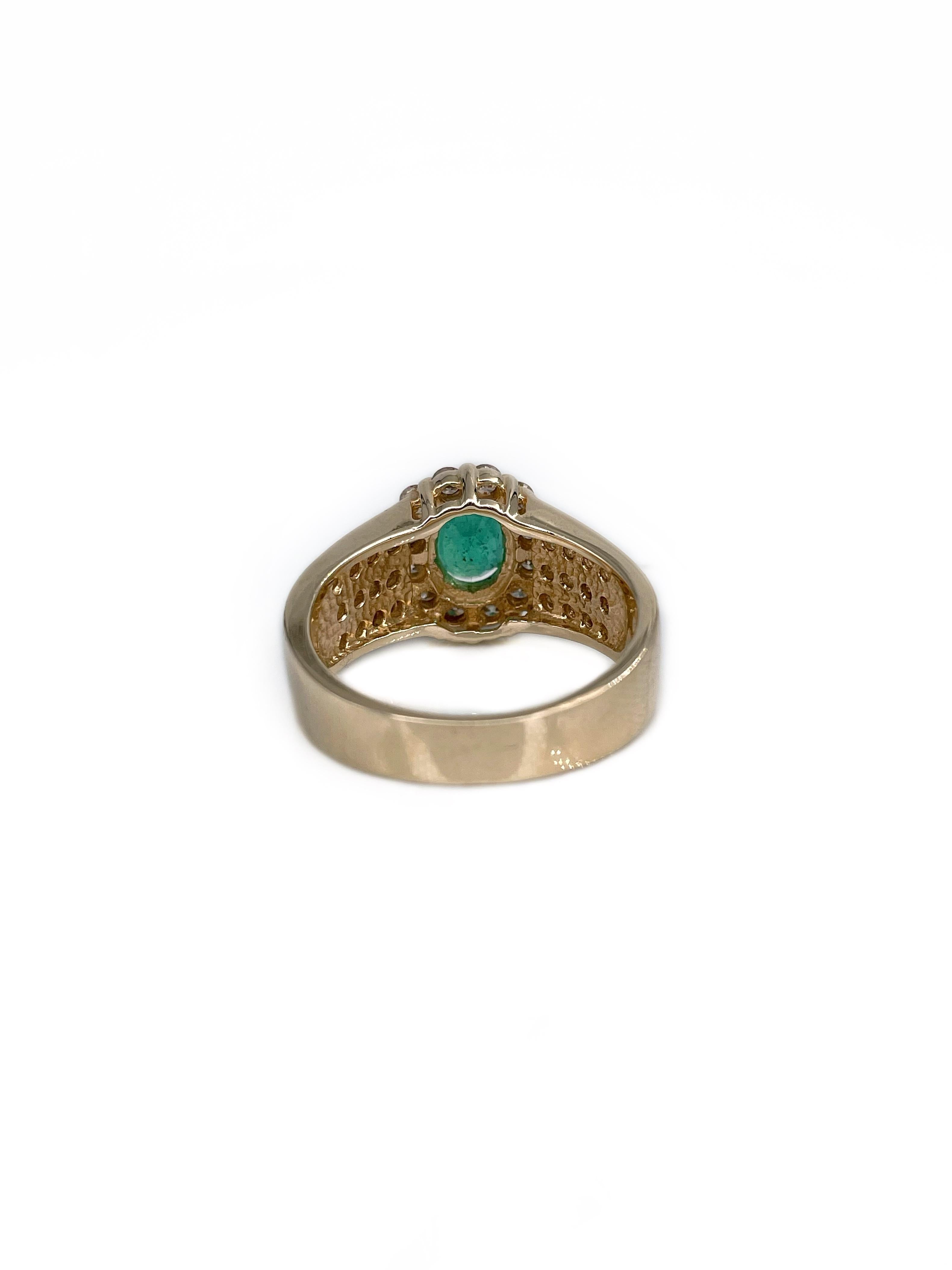 Mixed Cut Vintage 14 Karat Gold 0.90 Carat Oval Emerald 0.85 Carat Diamond Cluster Ring For Sale