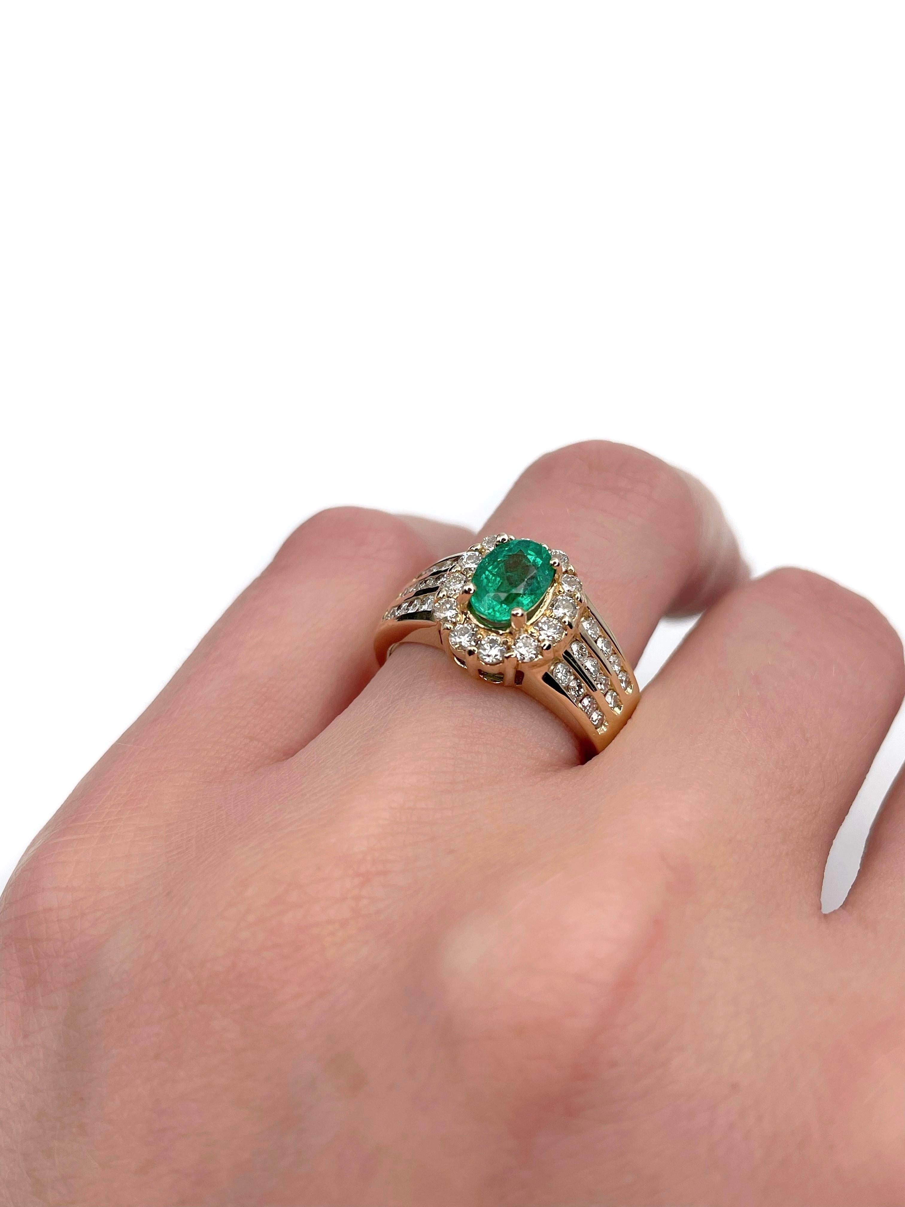 Women's Vintage 14 Karat Gold 0.90 Carat Oval Emerald 0.85 Carat Diamond Cluster Ring For Sale