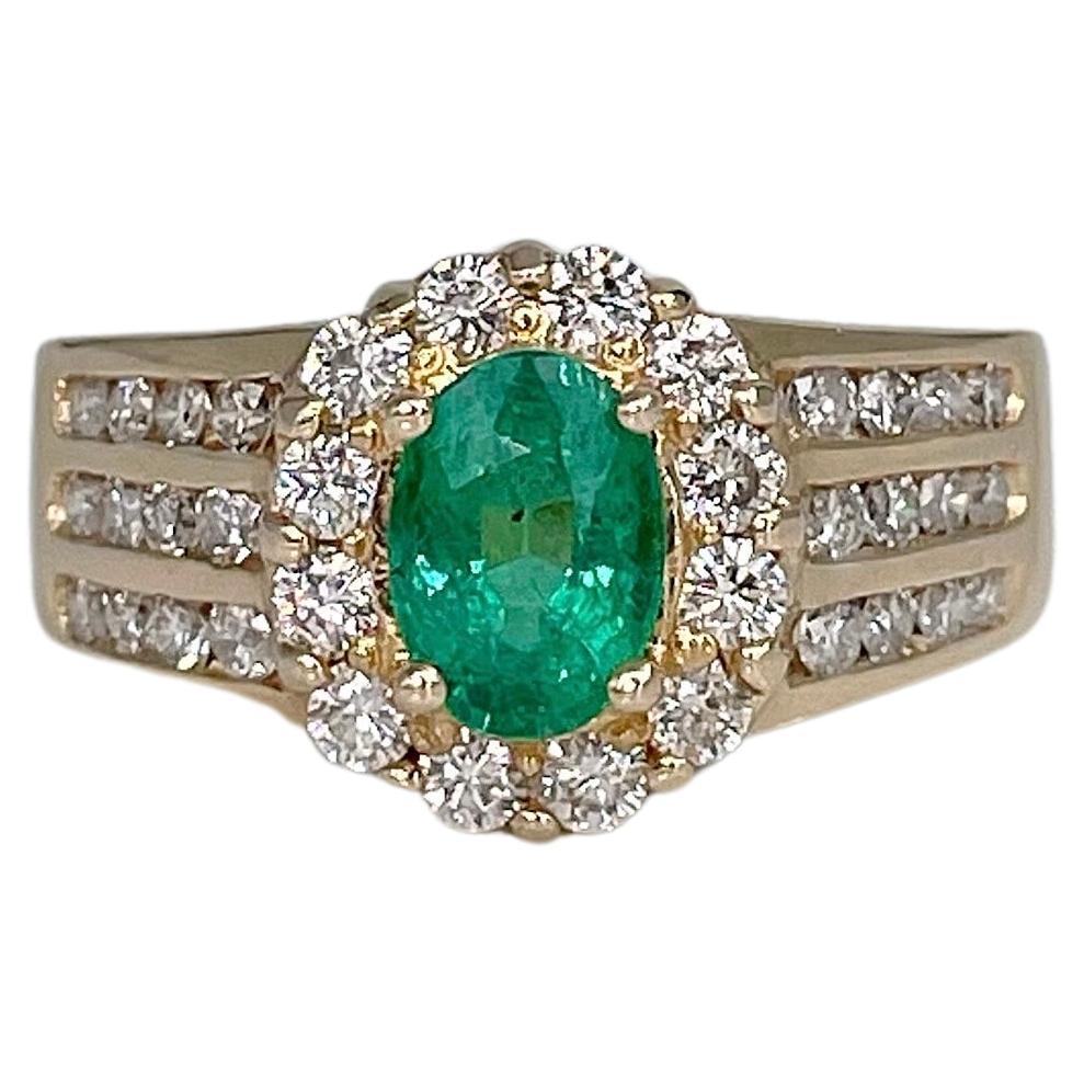 Vintage 14 Karat Gold 0.90 Carat Oval Emerald 0.85 Carat Diamond Cluster Ring For Sale