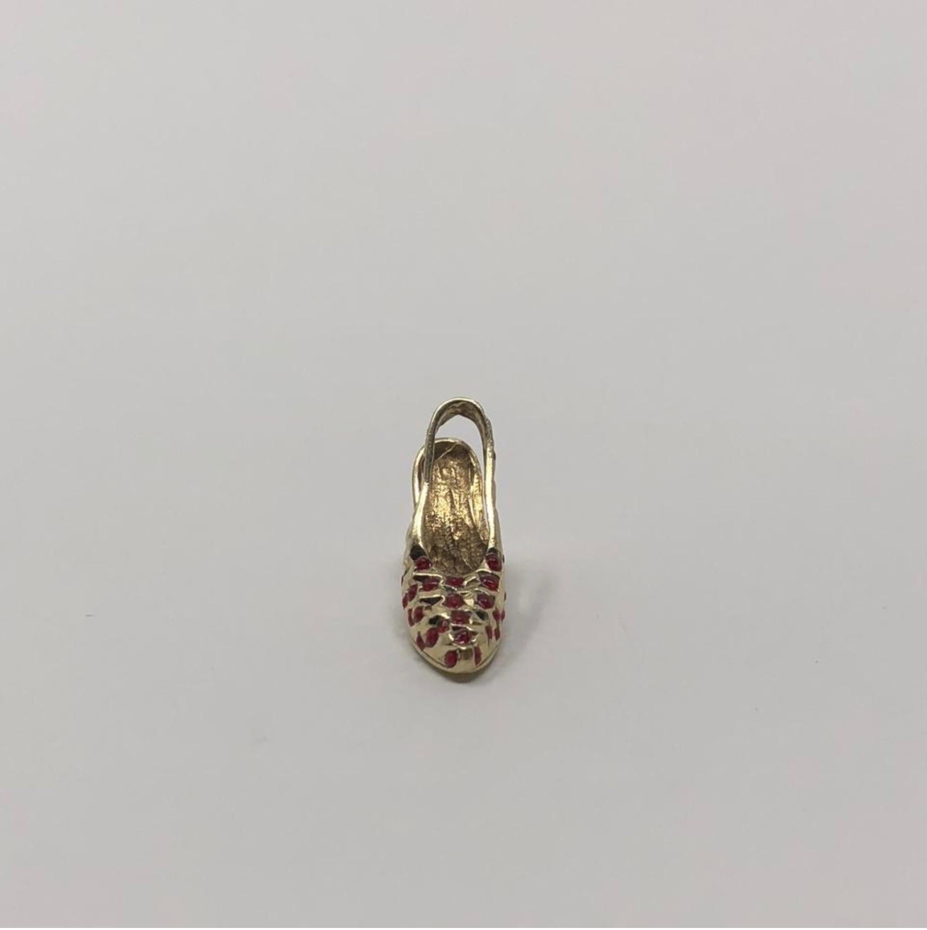 MODEL - Vintage 14k Gold Red Garnet High Heel Sling Back Pump Pendant Charm

CONDITION - Exceptional! No signs of wear.

SKU - 2362-FL

ORIGINAL RETAIL PRICE - 150 + tax

MATERIAL - 14k Gold

WEIGHT - 2.2 grams

DIMENSIONS - L.25 x H.75 x D.5

COMES