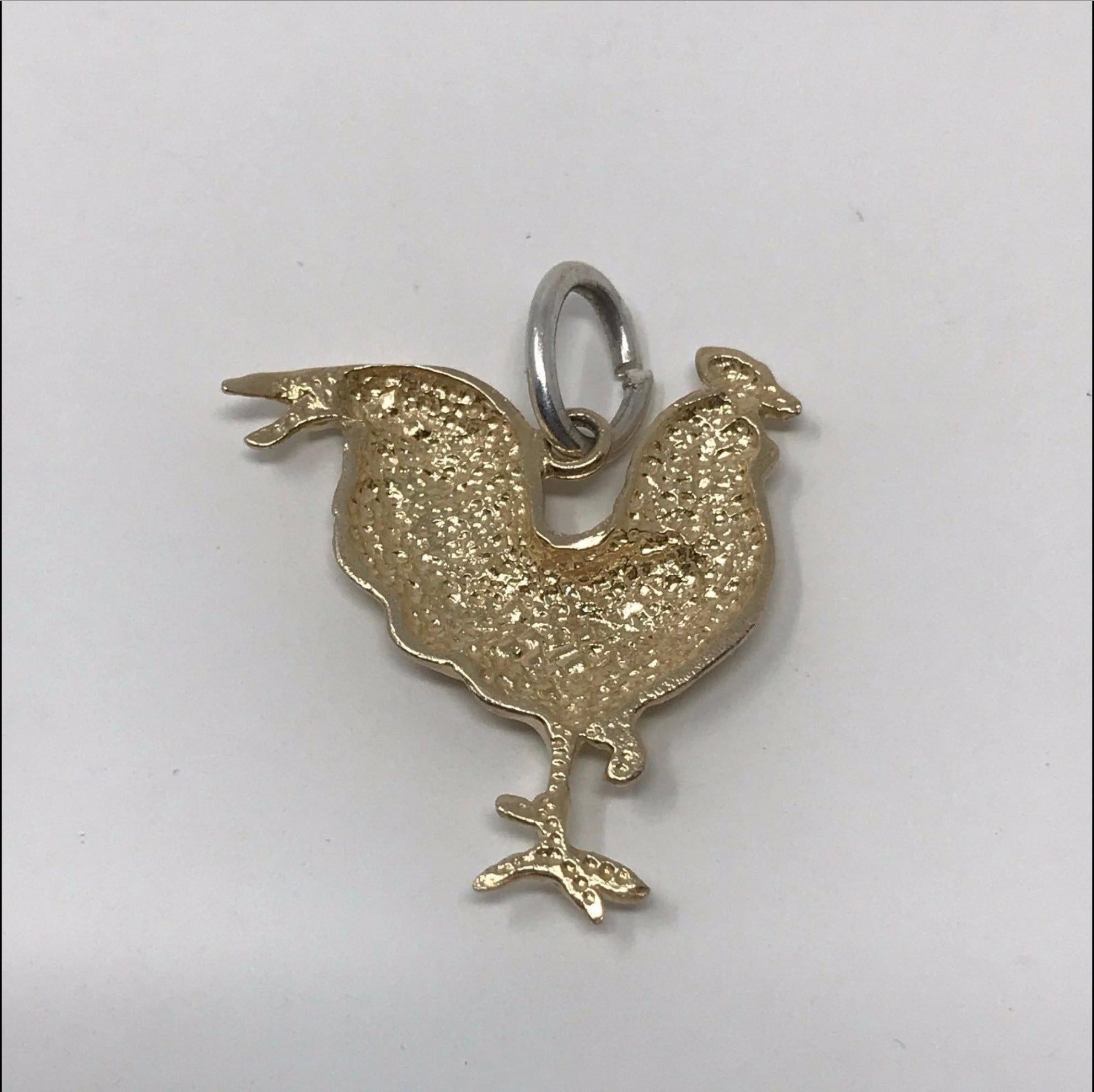 Model - Vintage 14k Gold Rooster Charm/Pendent

Condition - Exceptional

SKU - 1044-8

Original Retail - $480

Dimensions - 1.25 x 1 x .2

Closure Type - NA

Material - 14k Gold

Comes with - No additional accessories

Additional Information - Open