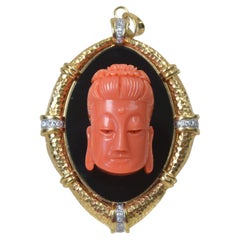 Retro 14 Karat Gold, White Diamond, Coral and Black Onyx Buddha Pendant