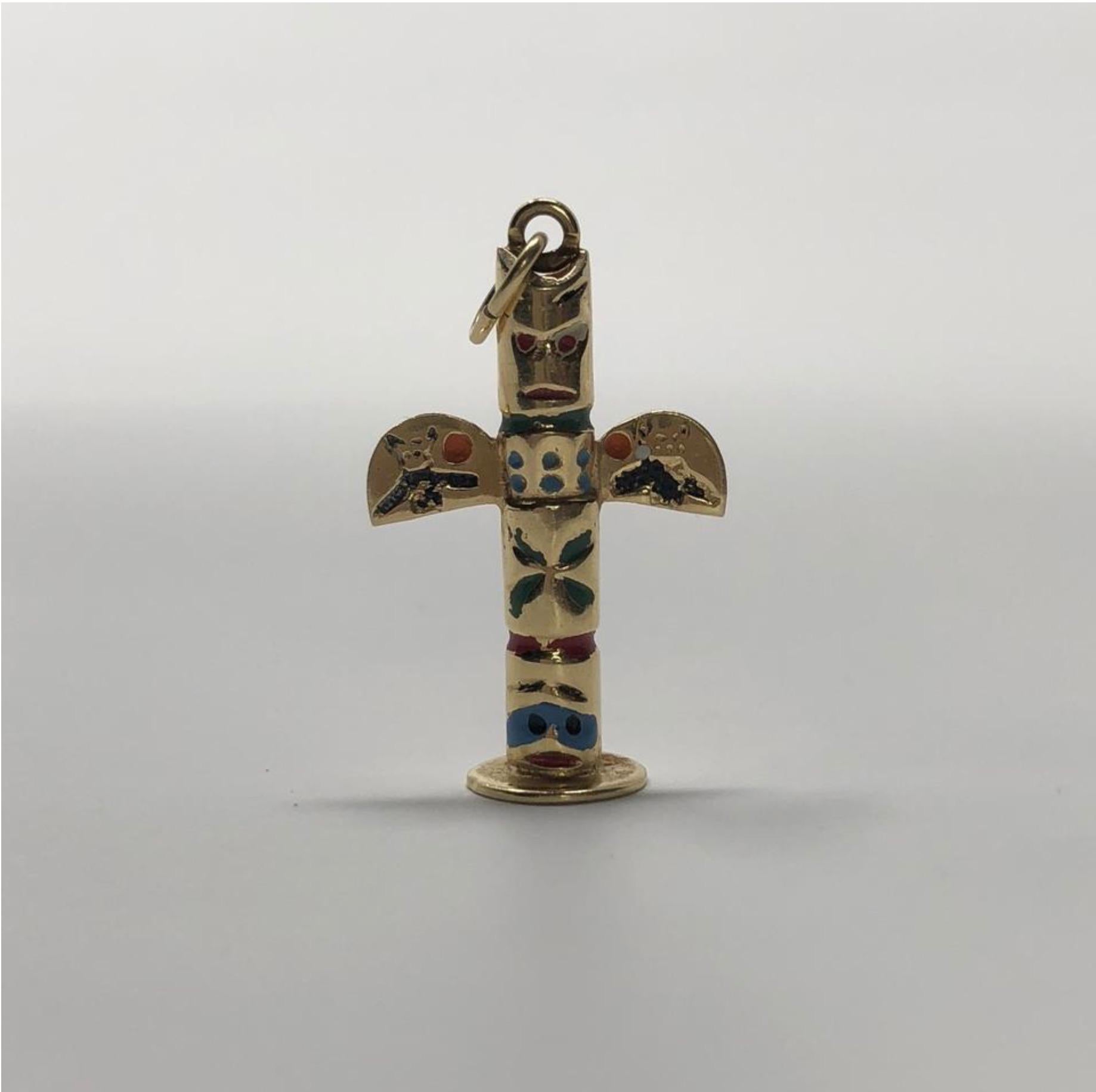 MODEL - Vintage 14k Gold with Enamel Totem Pole Pendent Charm

CONDITION - Exceptional! No signs of wear.

SKU - 2374-FL

ORIGINAL RETAIL PRICE - 250 + tax

MATERIAL - 14k Gold

WEIGHT - 3.1 grams

DIMENSIONS - L.6 x H1 (1.2 with bail) x D.25

COMES