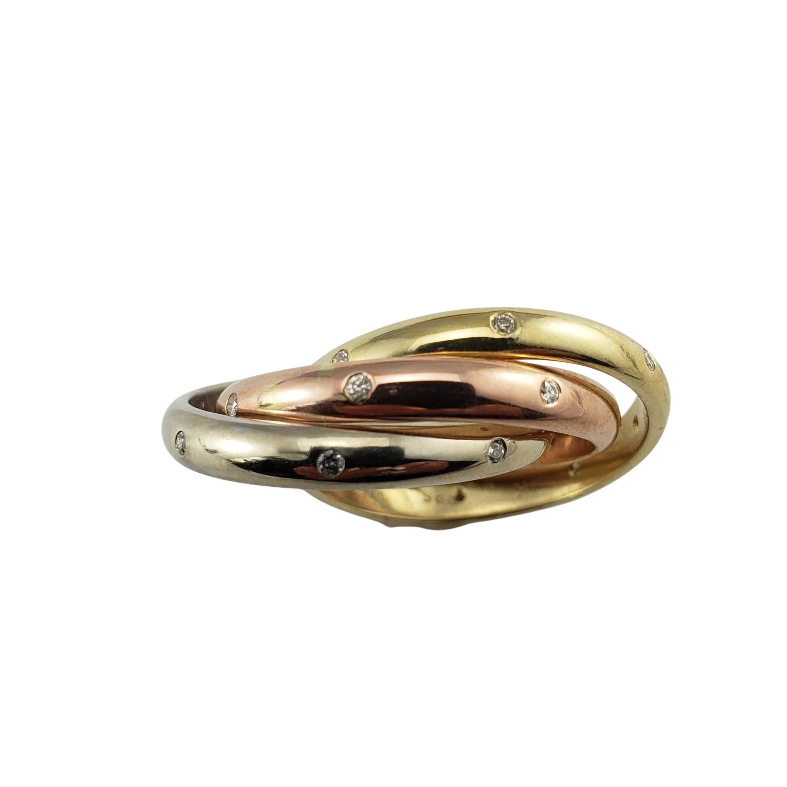 Vintage 14 Karat Tricolor Gold and Diamond Rolling Ring Size 7-

This elegant ring features three unfixed band in 14K yellow, white and rose gold that move together to slide on your finger. Each band is decorated with eight round brilliant cut