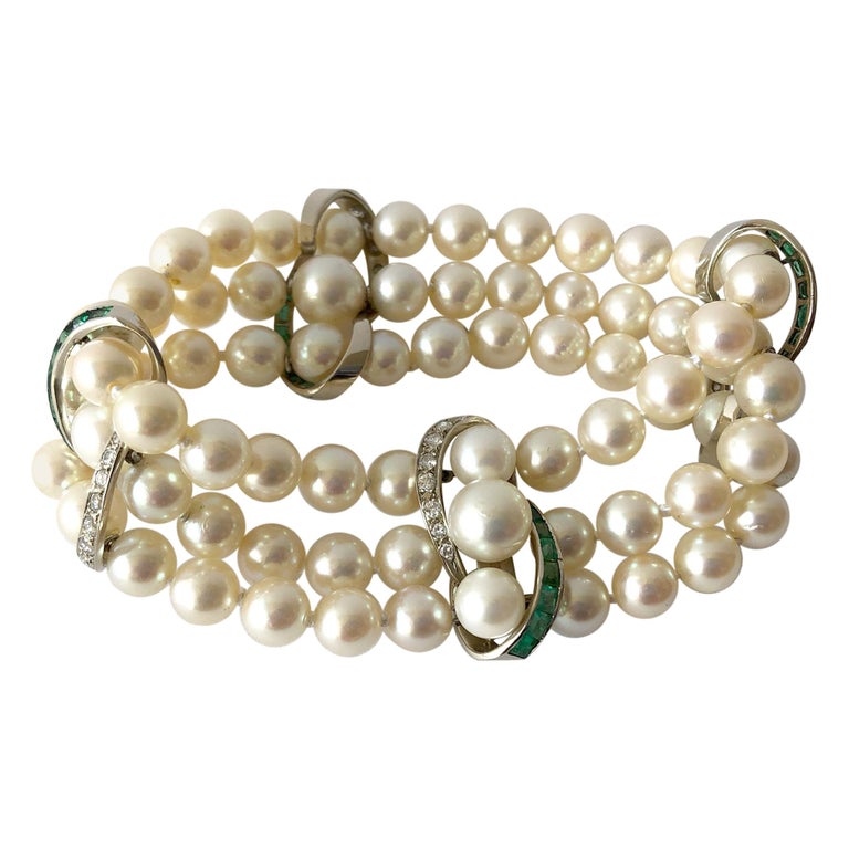 Vintage 14 Karat White Gold 1960s Diamond Emerald Pearl Three-Strand Bracelet For Sale