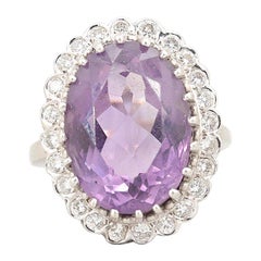 Vintage 14 Karat White Gold Amethyst and Diamond Halo Ring