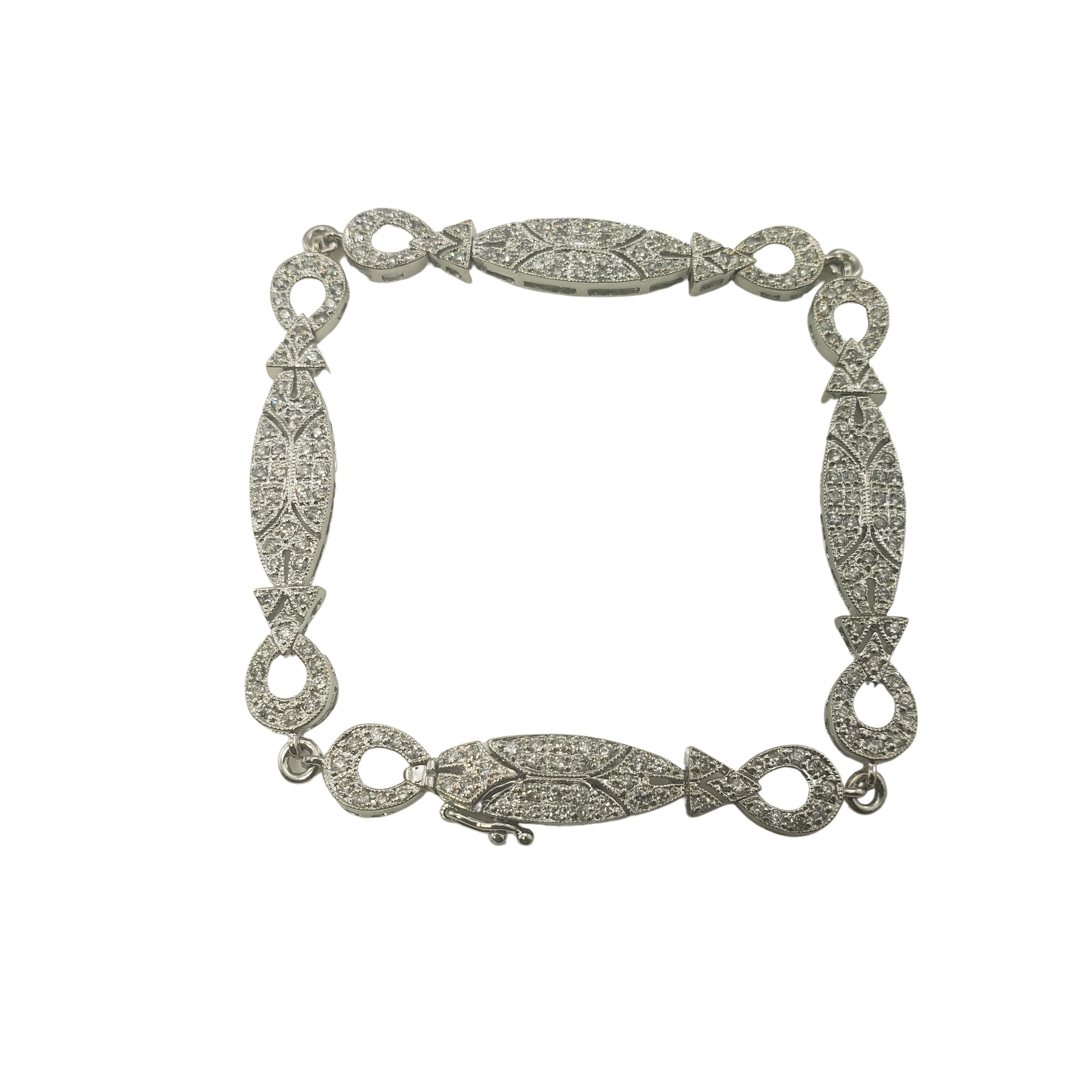 Taille brillant Bracelet vintage en or blanc 14 carats et diamants en vente