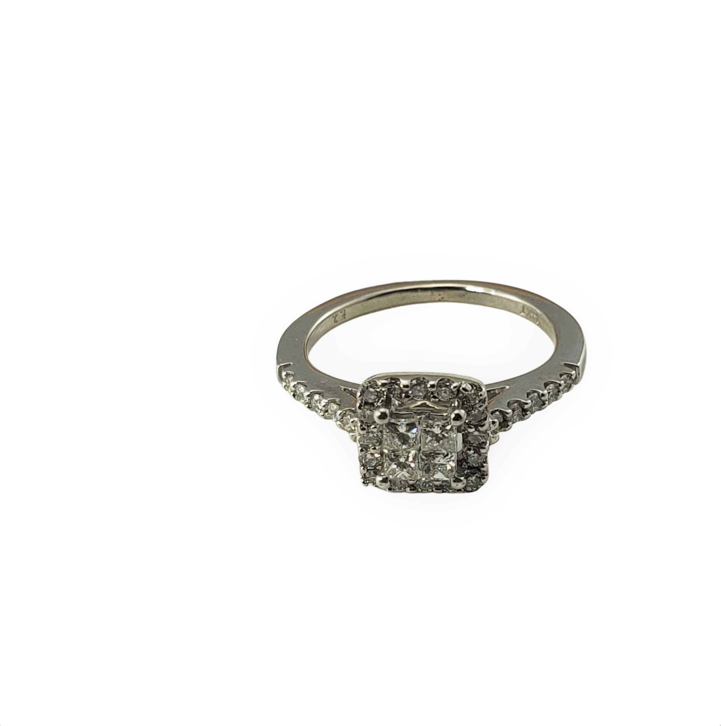 Vintage 14 Karat White Gold and Diamond Ring Size 4.25-

This sparkling ring features four princess cut diamonds and 26 round brilliant cut diamonds set in classic 14K white gold.
Shank: 1 mm. Top of ring measures 7 mm x 7 mm.

Approximate total