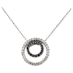 14 Karat White Gold Black and White Diamond Circle Necklace