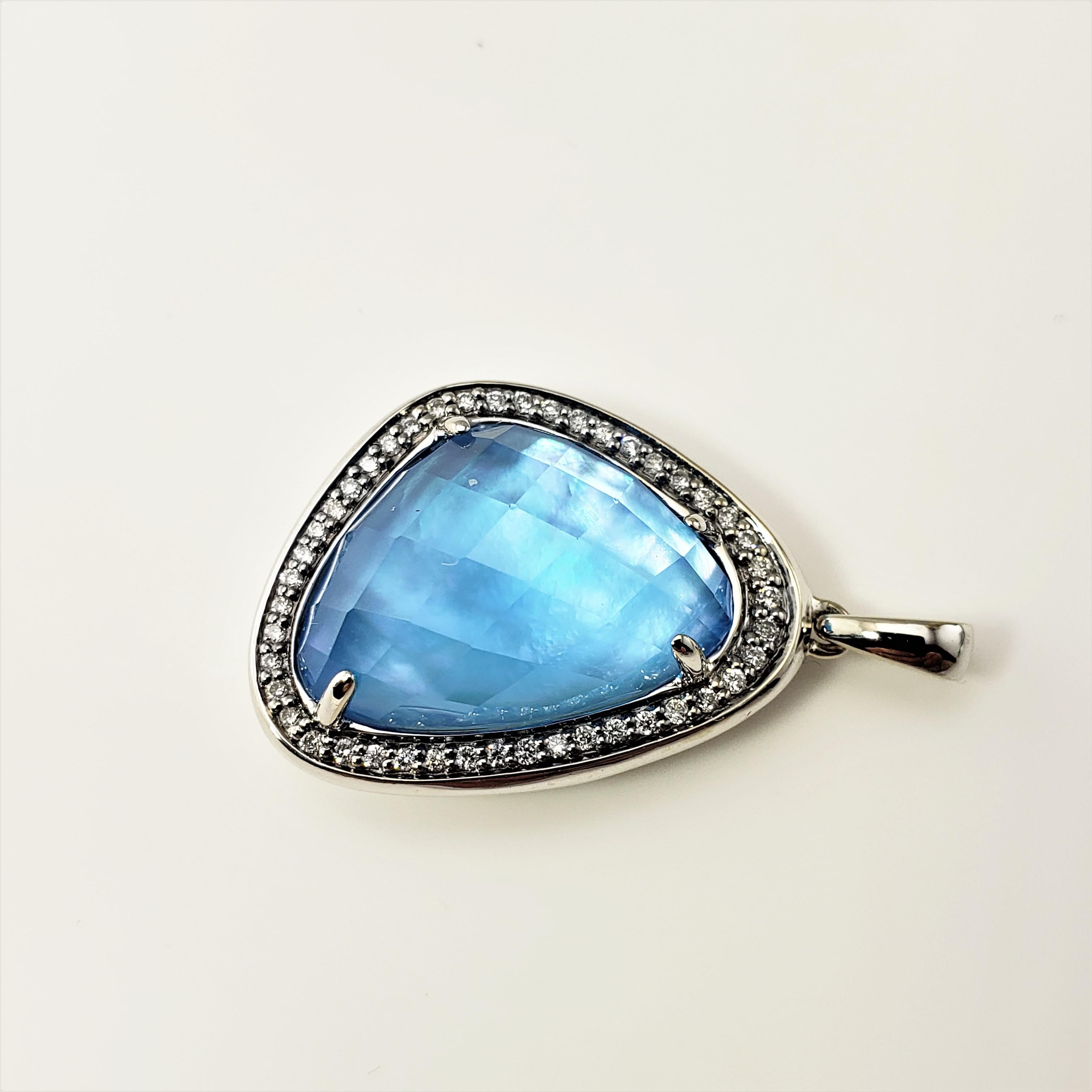 14 Karat White Gold Blue Opal and Diamond Pendant GAI Certified-

This stunning pendant features one faceted opal (17 mm x 15 mm) surrounded by 45 round brilliant cut diamonds and set in beautifully detailed 14K white gold.

Approximate total