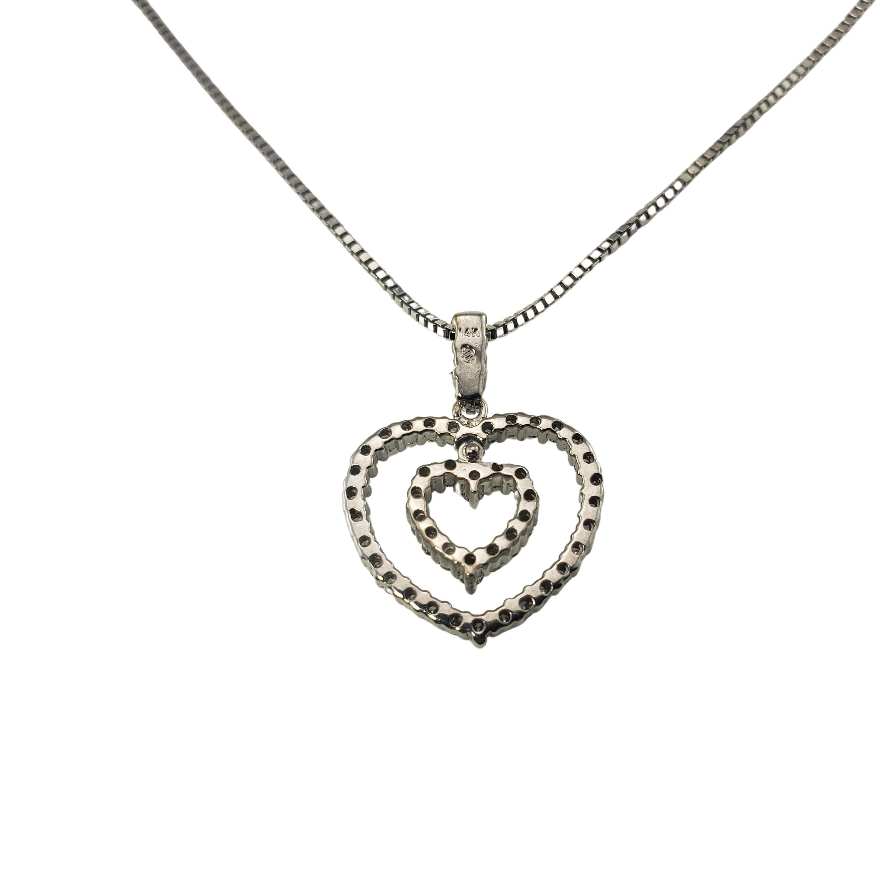 Vintage 14 Karat White Gold Diamond Double Heart Pendant Necklace In Good Condition For Sale In Washington Depot, CT
