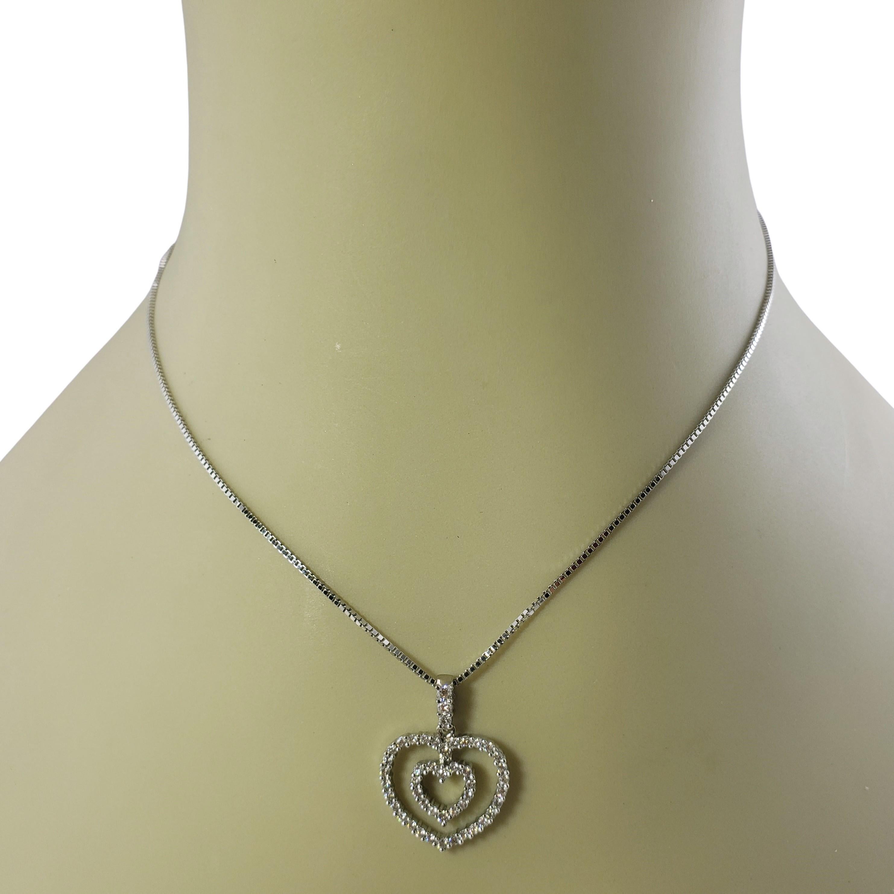 Vintage 14 Karat White Gold Diamond Double Heart Pendant Necklace For Sale 1