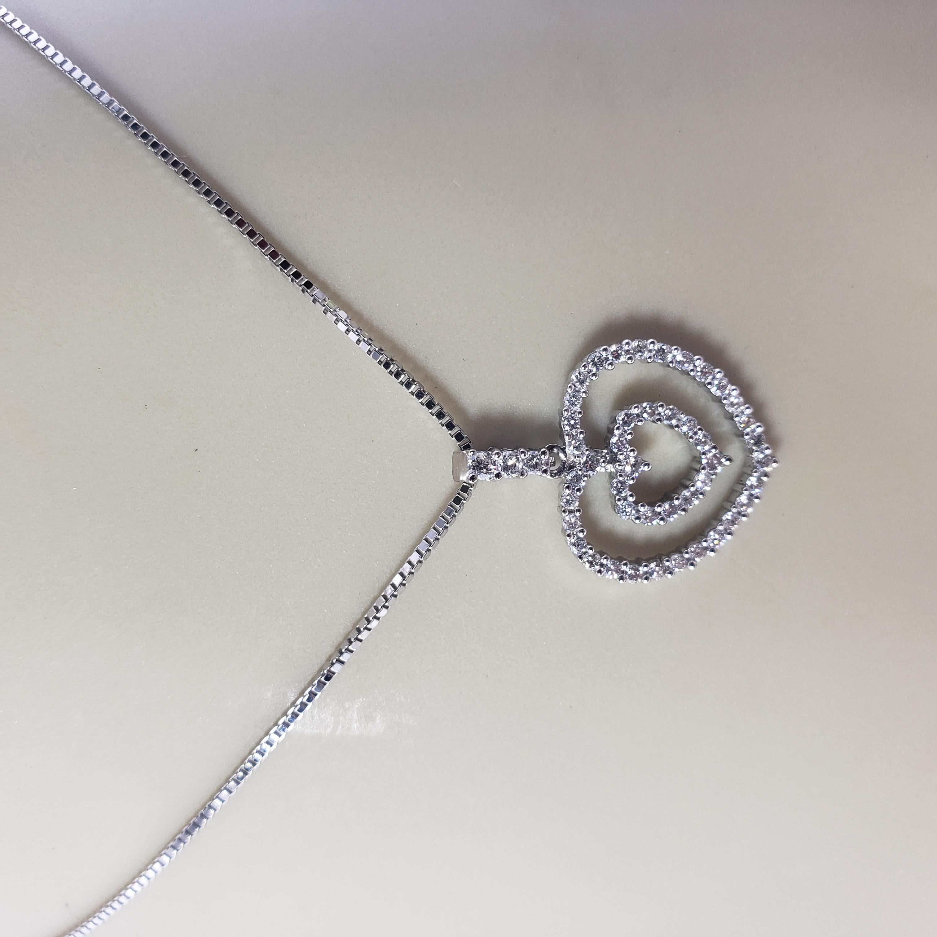 Vintage 14 Karat White Gold Diamond Double Heart Pendant Necklace For Sale 2
