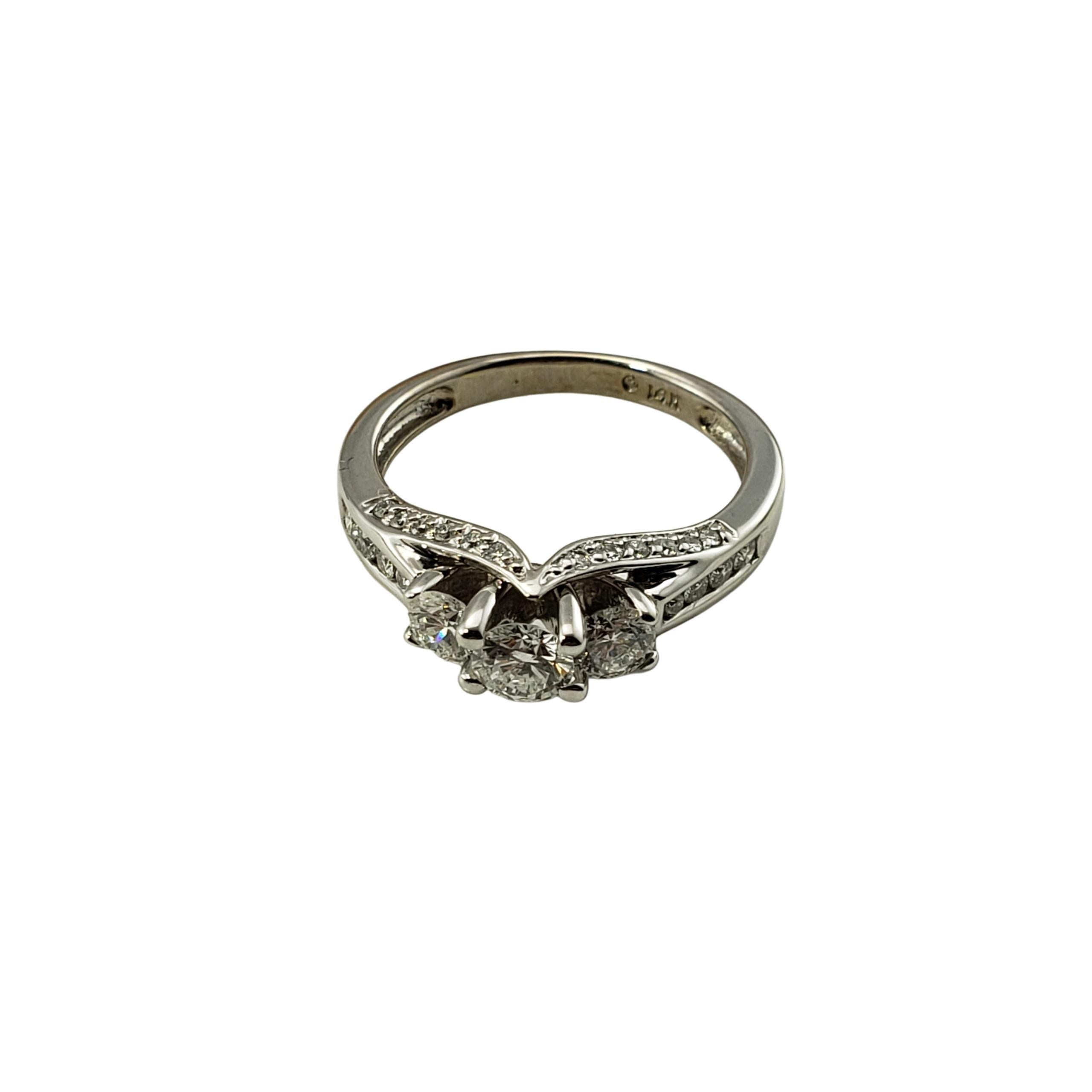 14 Karat White Gold Diamond Engagement Ring Size 7.25-

This sparkling ring features 36 round brilliant cut diamonds (center stone: .40 ct., two side stones: .30 ct. each) set in beautifully detailed 14K white gold.  

Shank:  2 mm.

Approximate