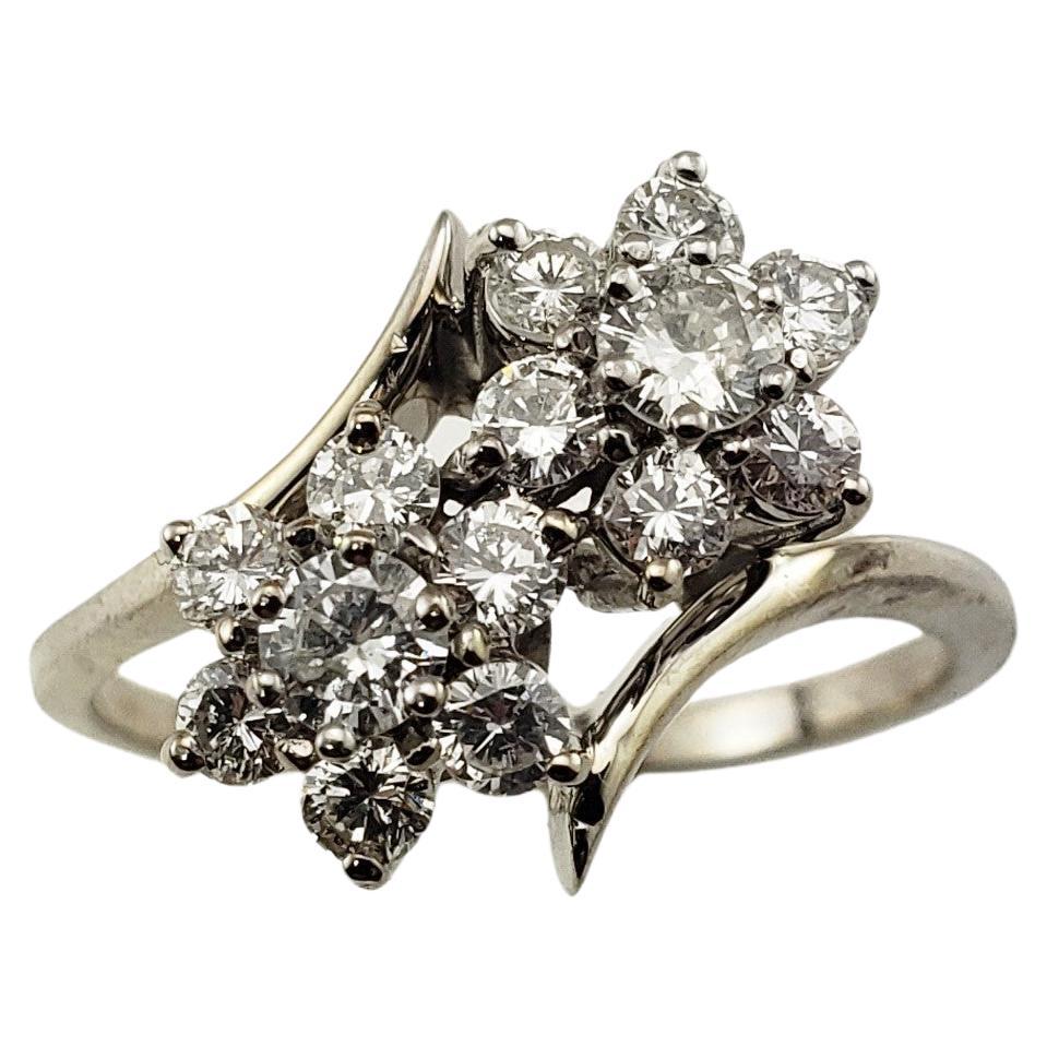 Vintage 14 Karat White Gold Diamond Flower Ring For Sale
