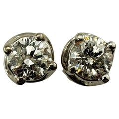 Clous d'oreilles vintage en or blanc 14 carats avec diamants .94 TCW