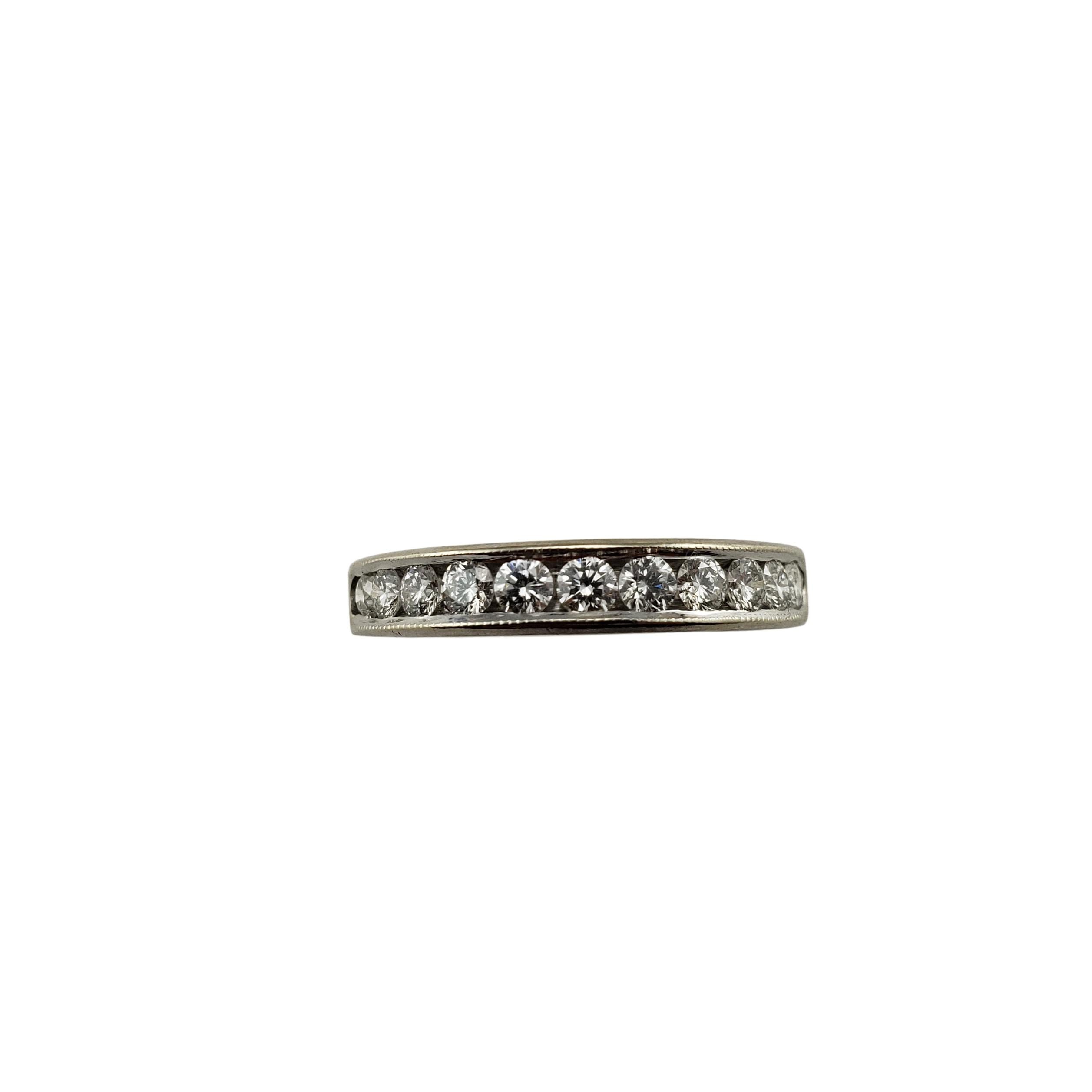 Vintage 14 Karat White Gold Diamond Wedding Band Ring Size 6-

This sparkling band features 11 round brilliant cut diamonds set in beautifully detailed 14K white gold. Width: 3.5 mm.
Shank: 2.5 mm.

Approximate total diamond weight: .55 ct.

Diamond