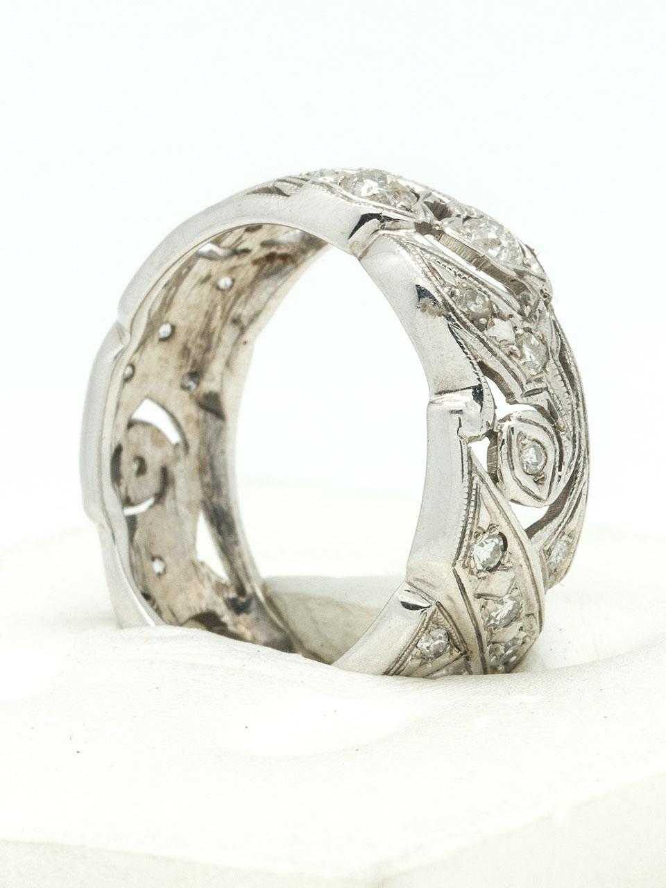 Beautifully carved vintage 14K white gold 8mm wide diamond eternity band set with approximately 0.50cts diamonds. Size 8, cannot be adjusted. Circa 1940s.

SKU: 27636
