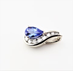 14 Karat White Gold Tanzanite and Diamond Pendant