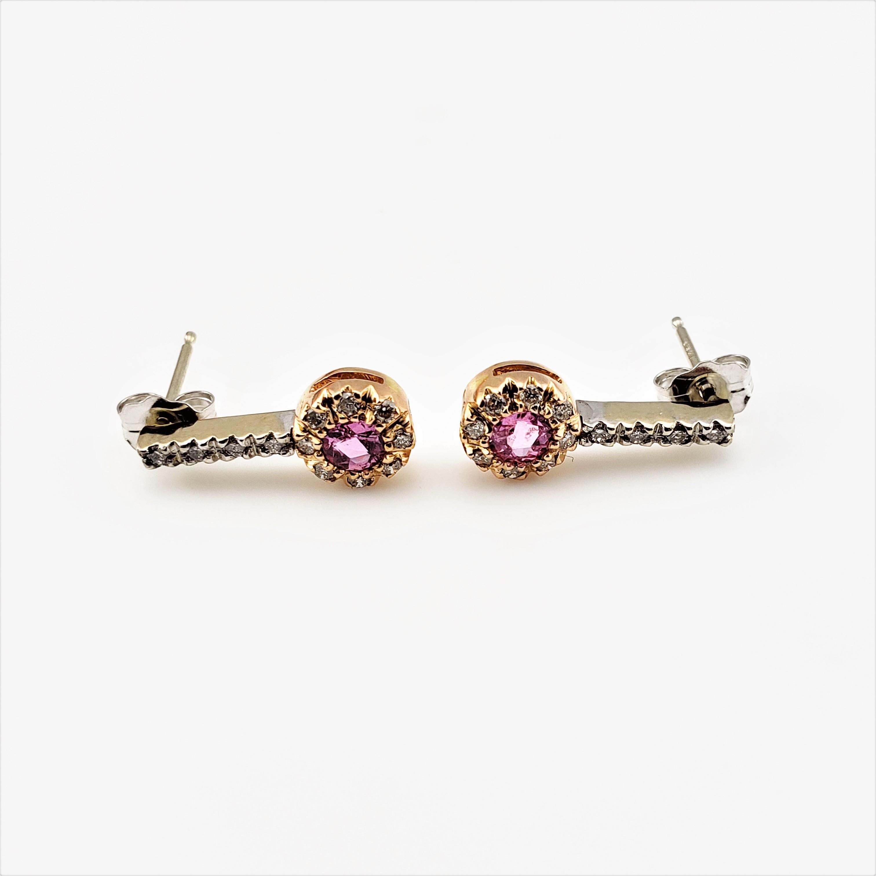 14 Karat Yellow and White Gold Pink Sapphire and Diamond Earrings GAI Certified-

These stunning earrings each feature one round pink sapphire (.10 ct. each) and 12 round brilliant cut diamonds set in beautifully detailed 14K white and yellow gold. 