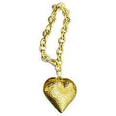 Bracciale vintage a maglie in oro giallo 14 carati da 24,3 gm con charme e cuore