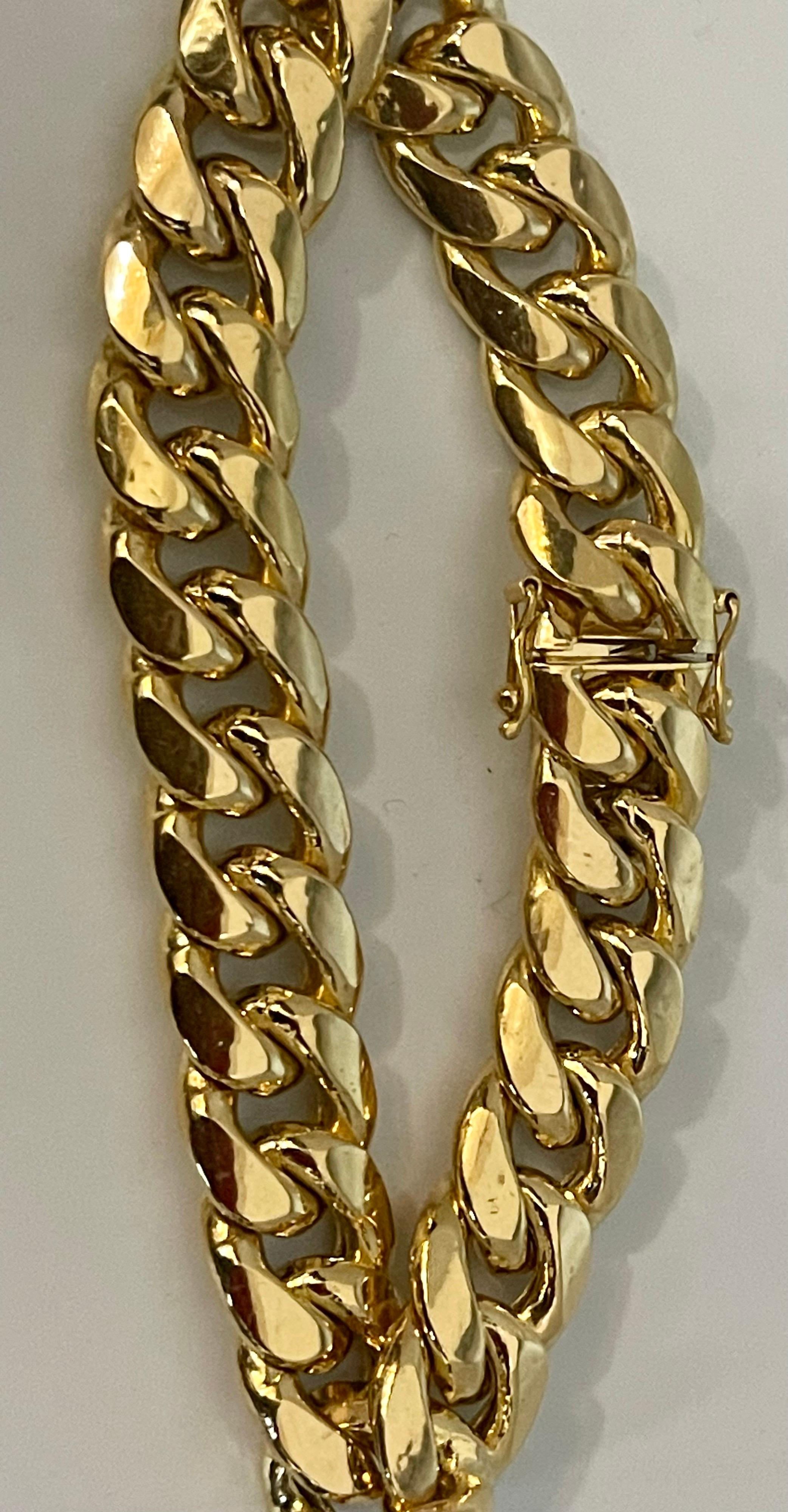 
Vintage 14 Karat Yellow Gold  33.4 Gm Cuban link Bracelet 7.75 Inch Long Unisex
14K Gold Cuban Bracelet made of authentic solid gold.  It is  nicely polished and stamped for authenticity. 

This  Cuban chain Bracelet  has a gorgeous shine. Superior