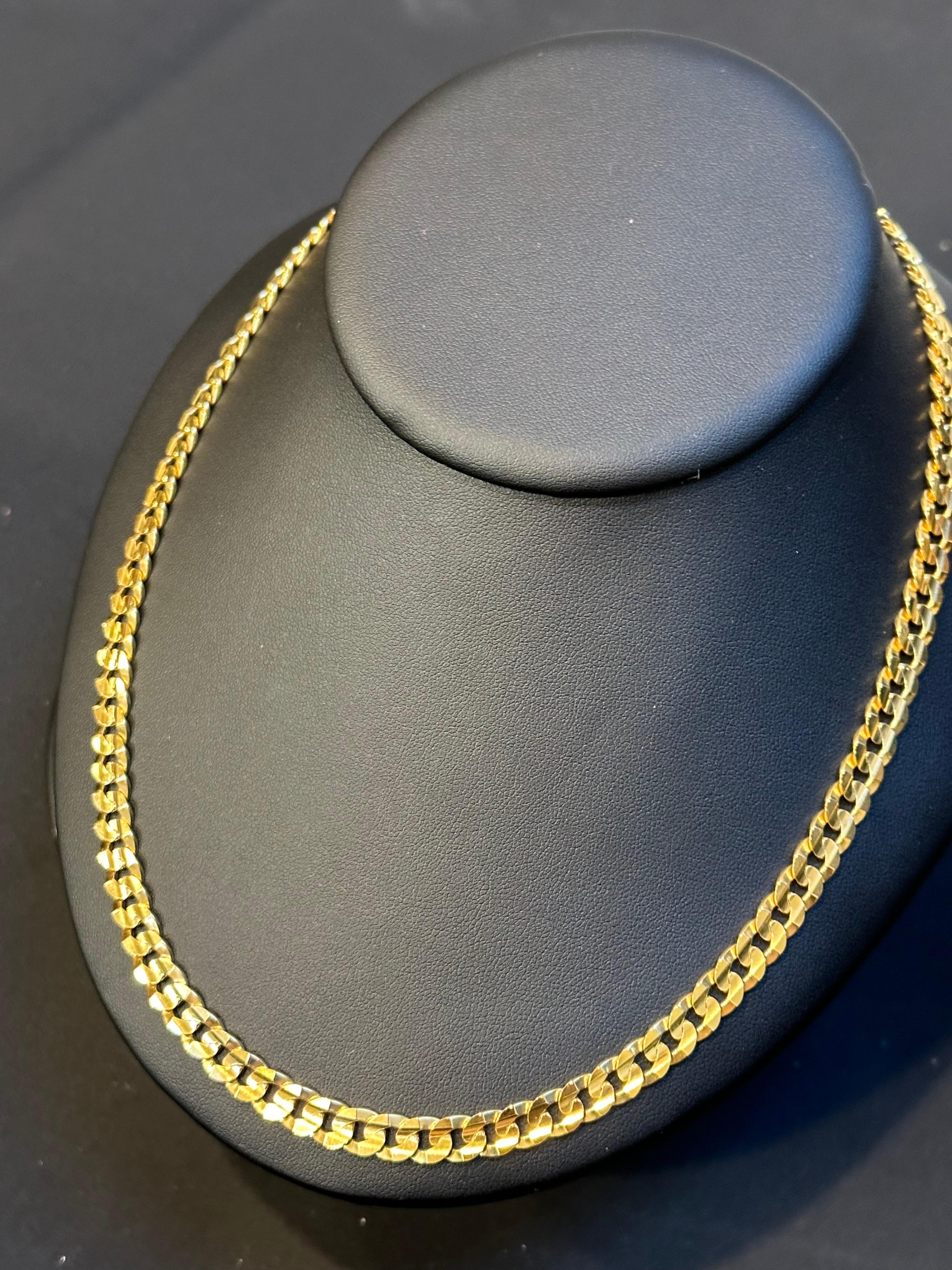 For those in search of high-quality, authentic gold jewelry, this Vintage 14 Kt Yellow Gold Cuban link chain is a must-see. Made from solid 14K gold, this chain is both durable and luxurious, with a weight of 40.6 grams.
It is 8 mm wide 

Crafted in