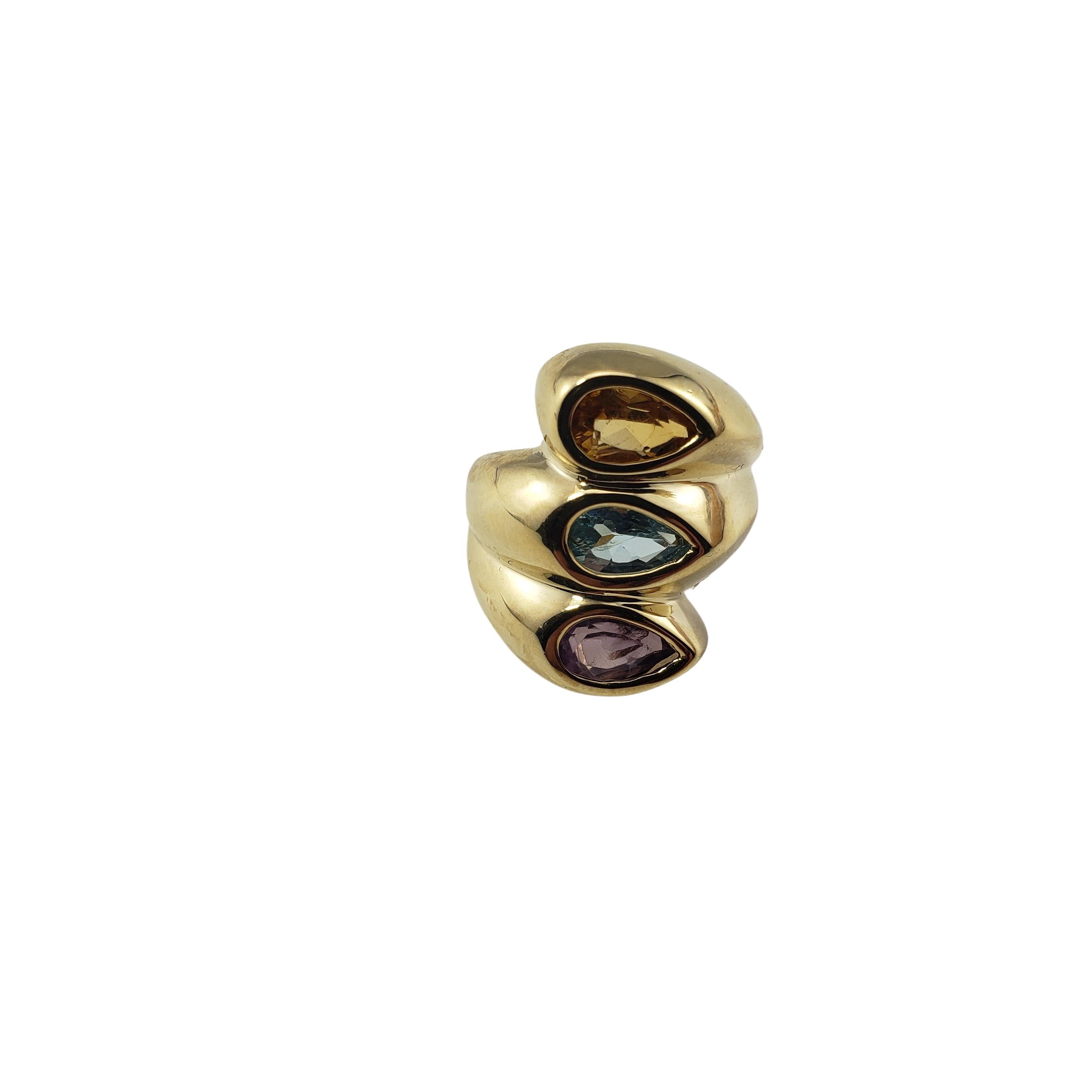 Vintage 14 Karat Yellow Gold Amethyst and Topaz Ring Size 5.5-

This lovely ring features three pear shaped gemstones (amethyst, blue topaz, yellow topaz 8 mm x 4 mm each) set in beautifully detailed yellow gold.  
Width:  22 mm 
Shank:  3