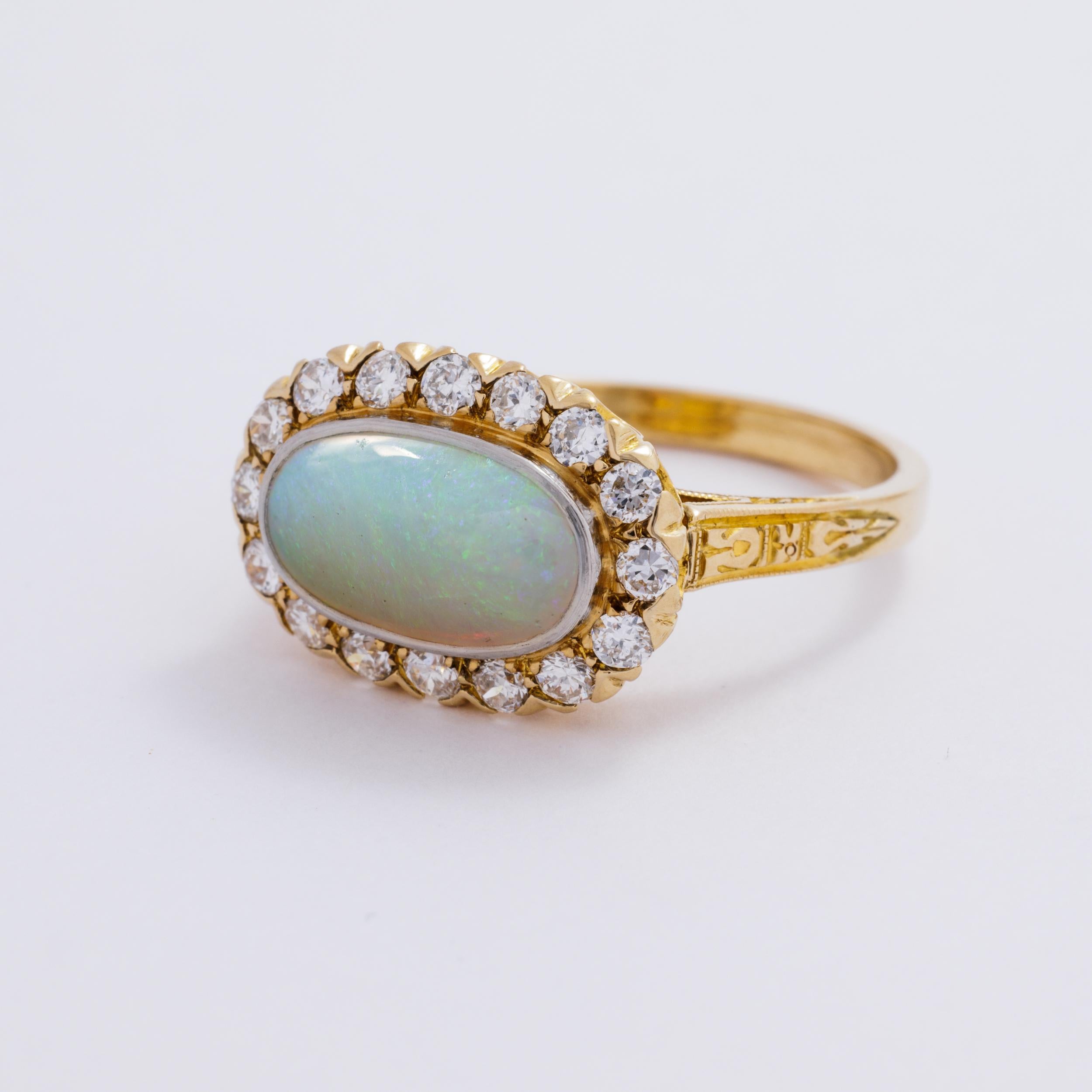 Modern Vintage 14 Karat Yellow Gold and 1.8 Carat Opal Ring with 0.90 Carats Diamonds For Sale