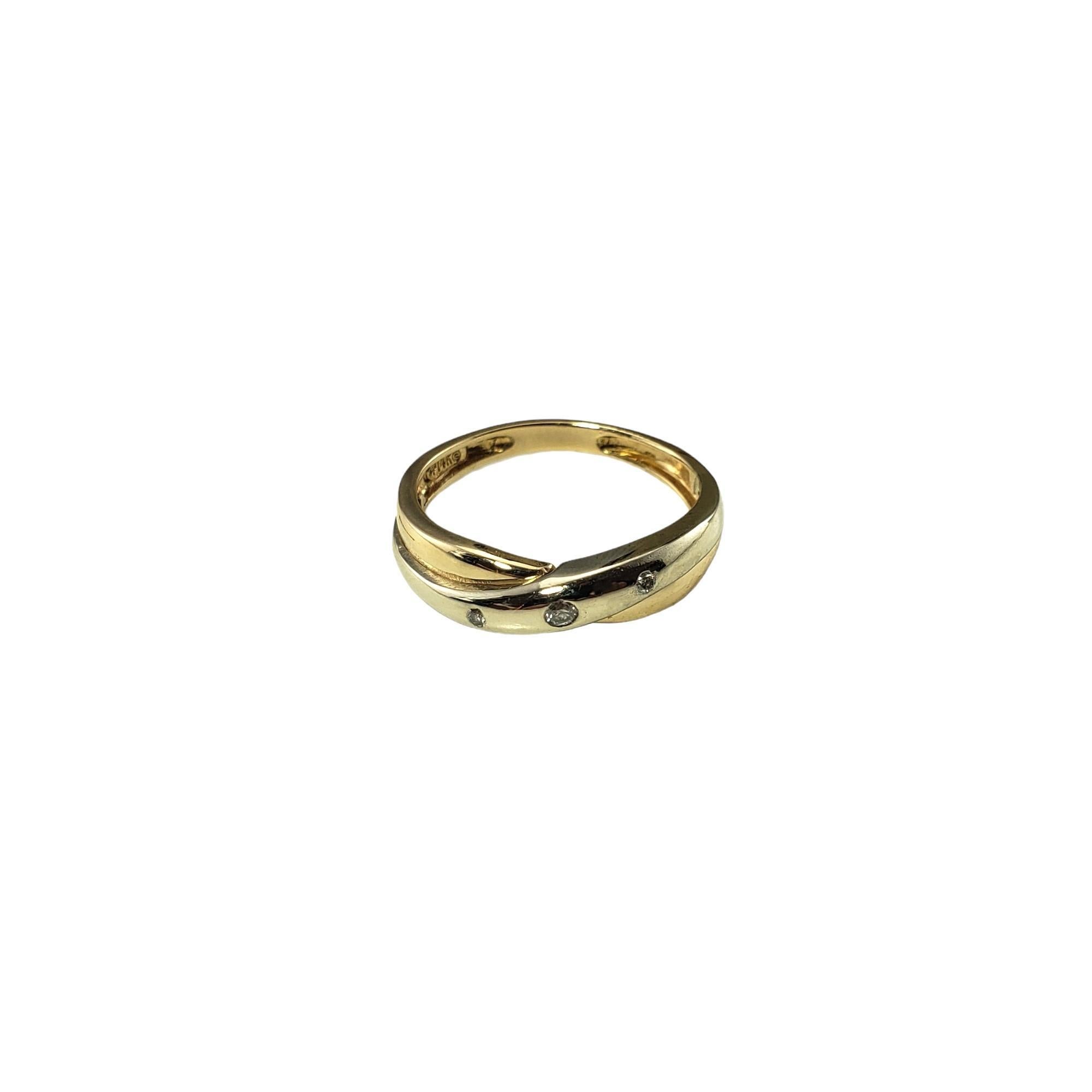 Vintage 14 Karat Yellow Gold Band Ring Size 7-

This elegant band features three round brilliant cut diamonds set in classic 14K yellow gold.  Width: 5 mm.  Shank: 2 mm.

Approximate total diamond weight: .05 ct.

Diamond color: H-I

Diamond