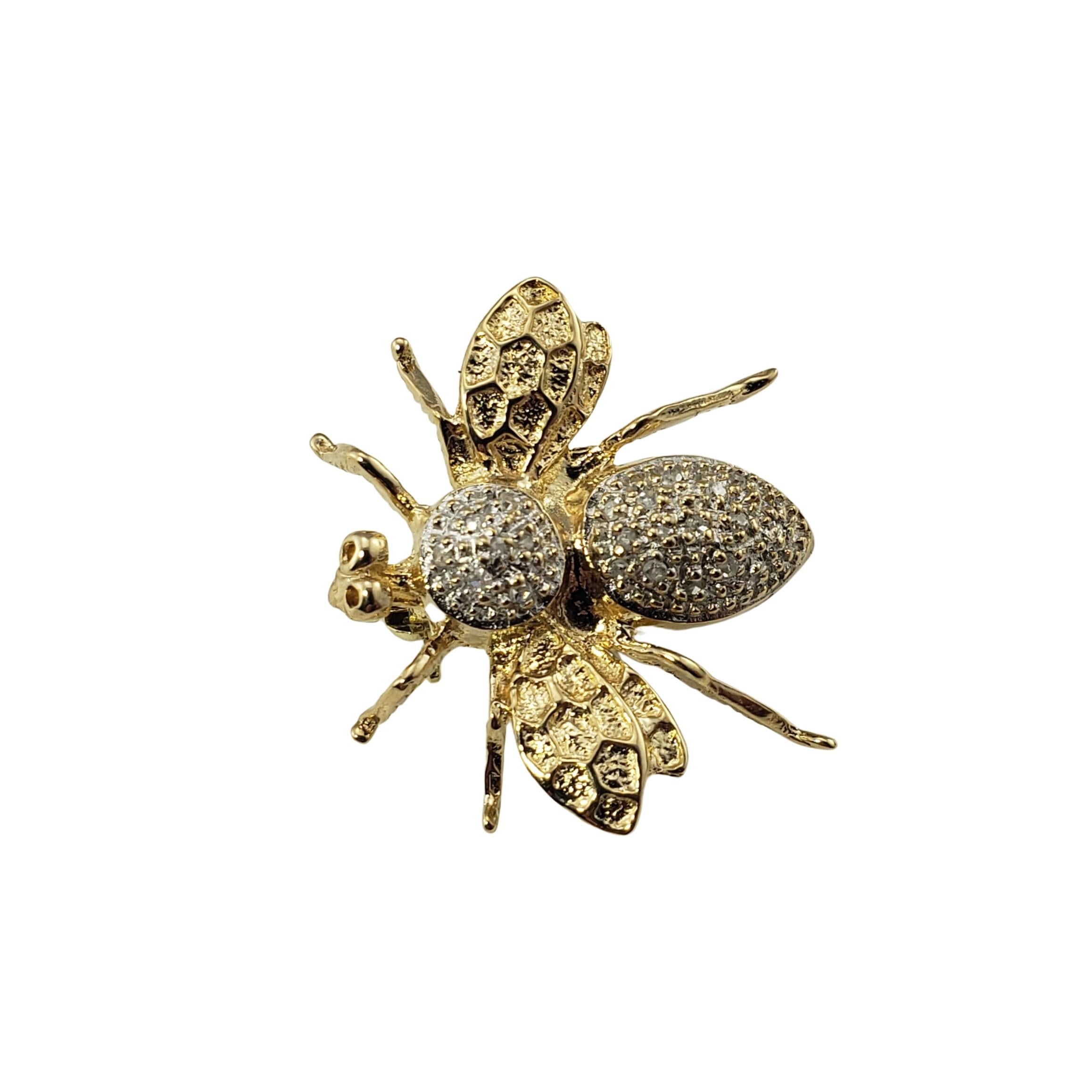 Vintage 14 Karat Yellow Gold and Diamond Bee Brooch/Pendant-

This lovely bee pin is decorated with 10 round single cut diamonds set in beautifully detailed 14K yellow gold.  Can be worn as a brooch or a pendant.

Approximate total diamond weight: 