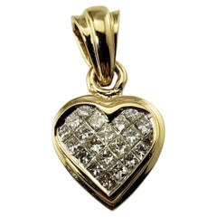Pendentif cœur en or jaune 14 carats et diamants