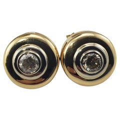 14 Karat Yellow Gold and Diamond Stud Earrings