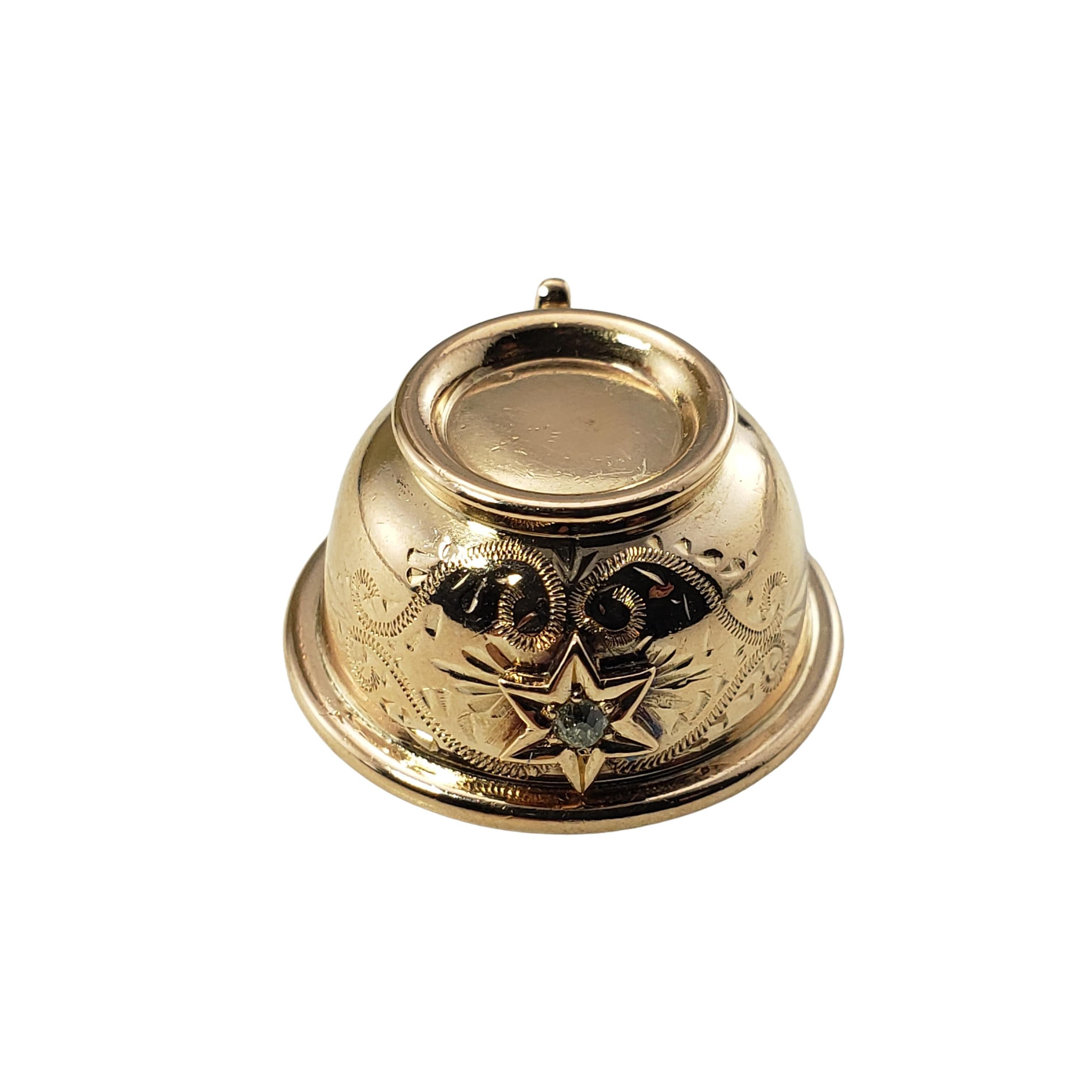 14 Karat Yellow Gold and Diamond Teacup Charm-

This lovely 3D charm features a miniature teacup accented with one round single cut diamond set in beautifully detailed 14K yellow gold.

Approximate total diamond weight:  .03 ct.

Diamond color: Top